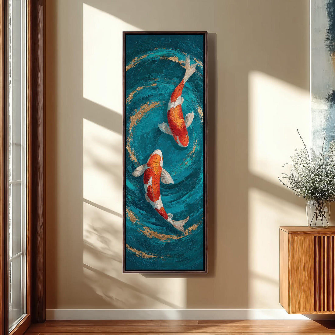 a large painting of two koi fish swimming in a blue and gold pond, hanging on a wall in a room with a wooden cabinet and a vase of flowers.