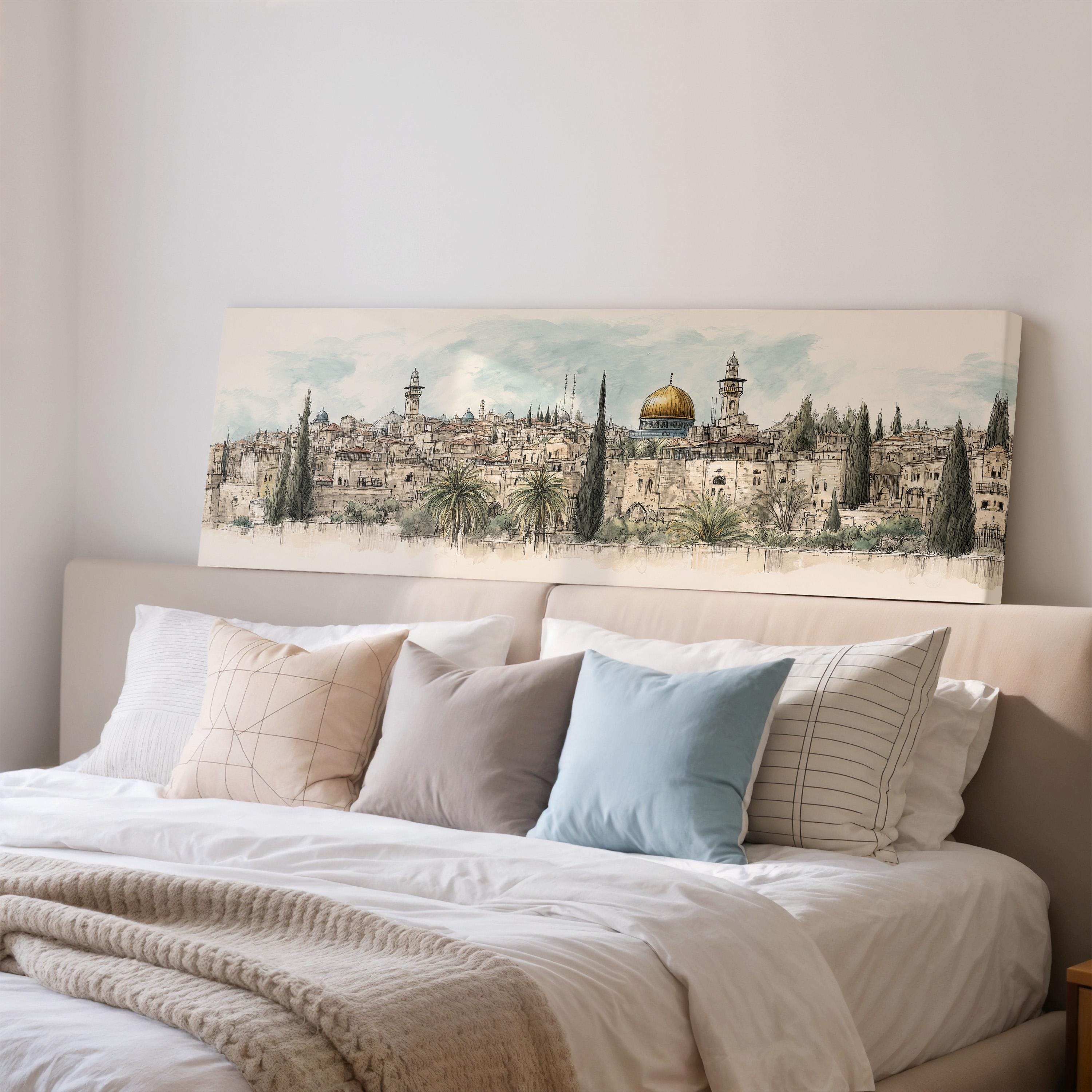 a large painting of a cityscape on the wall above a bed with white bedding and pillows.