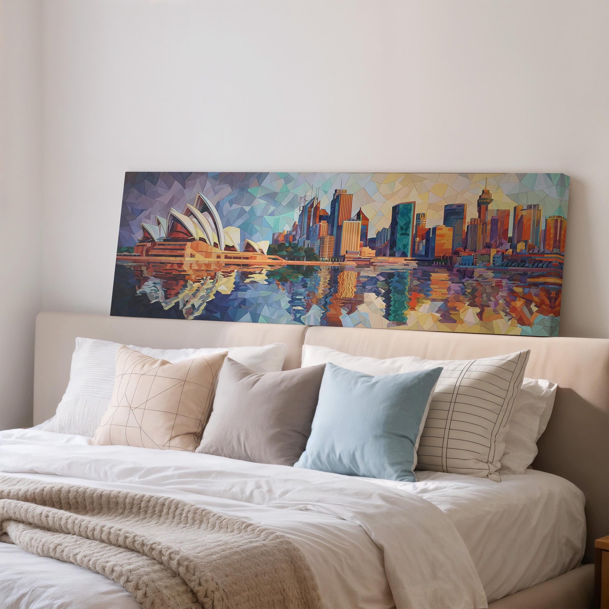 a large painting of the Sydney Opera House on a wall above a bed with white bedding and pillows.