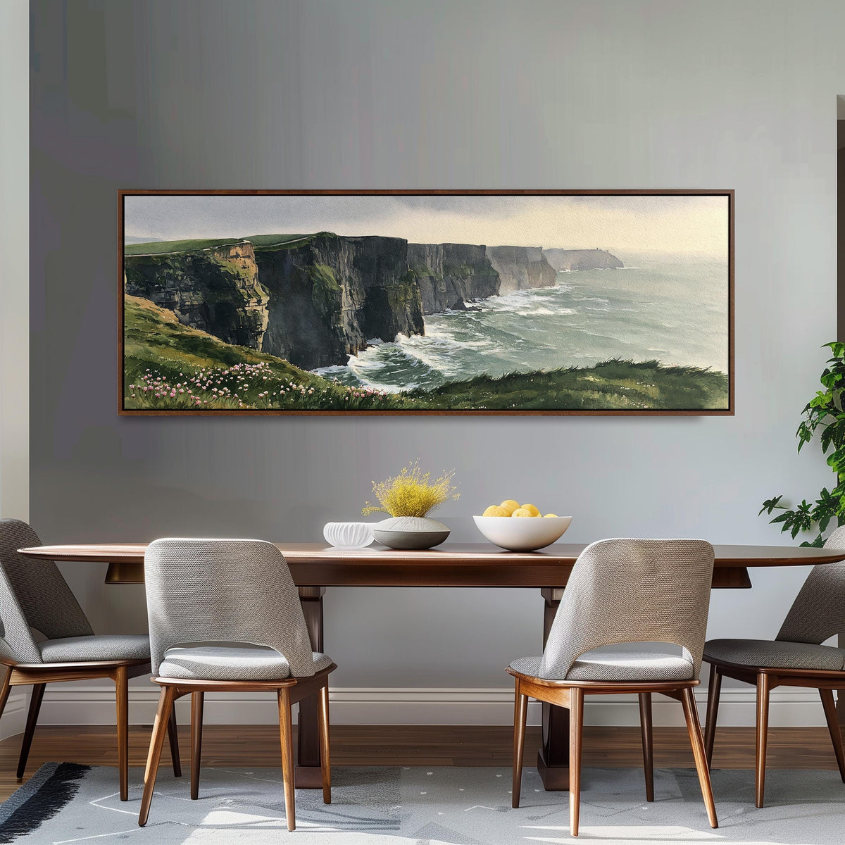 Green sea cliffs with wildflowers long horizontal canvas print above a dining table