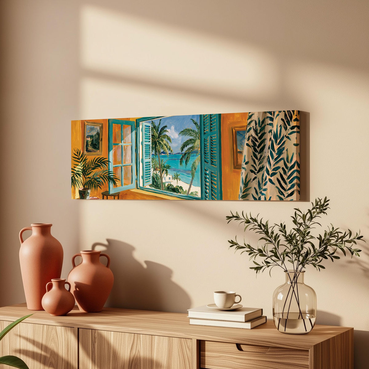 Beach house window overlooking palms and sea long horizontal canvas print above a wooden sideboard