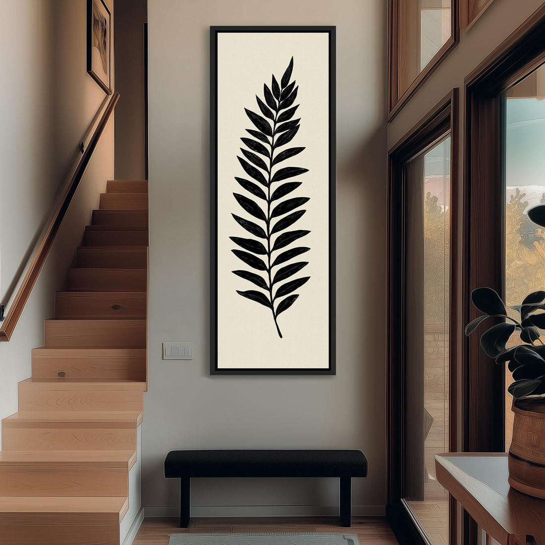 a modern interior design with a large black and white leaf-like artwork hanging on the wall above a black bench. The room has wooden stairs leading up to a door, and a potted plant is visible on the right side of the image.