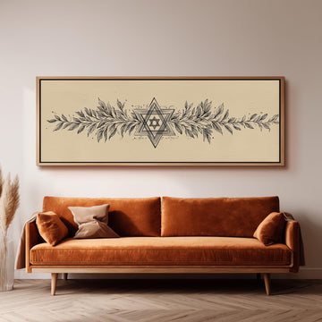 a large, ornate, and detailed painting of a star above a brown sofa with decorative pillows.