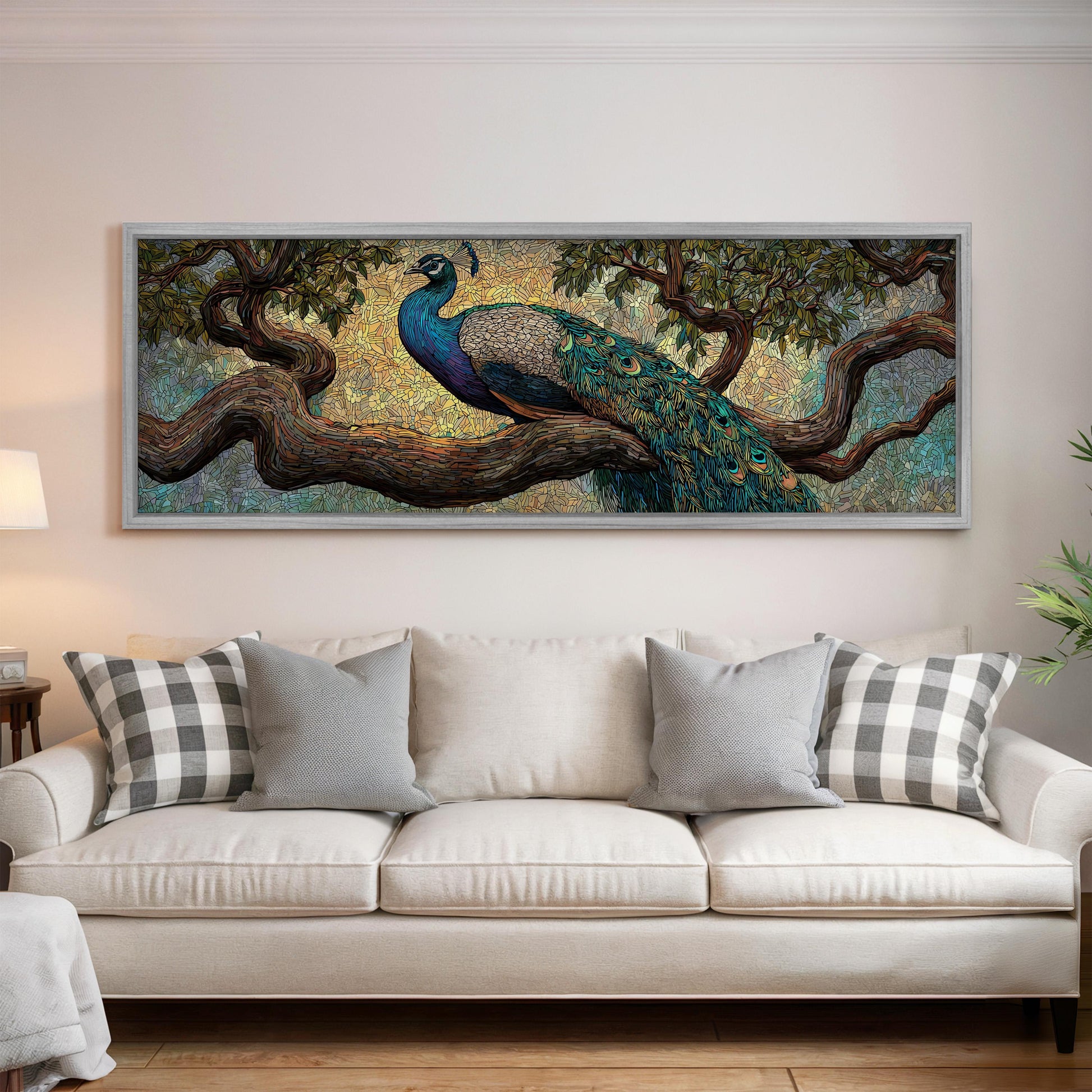 A large painting of a peacock perched on a tree branch is displayed on the wall above a white sofa in a living room.