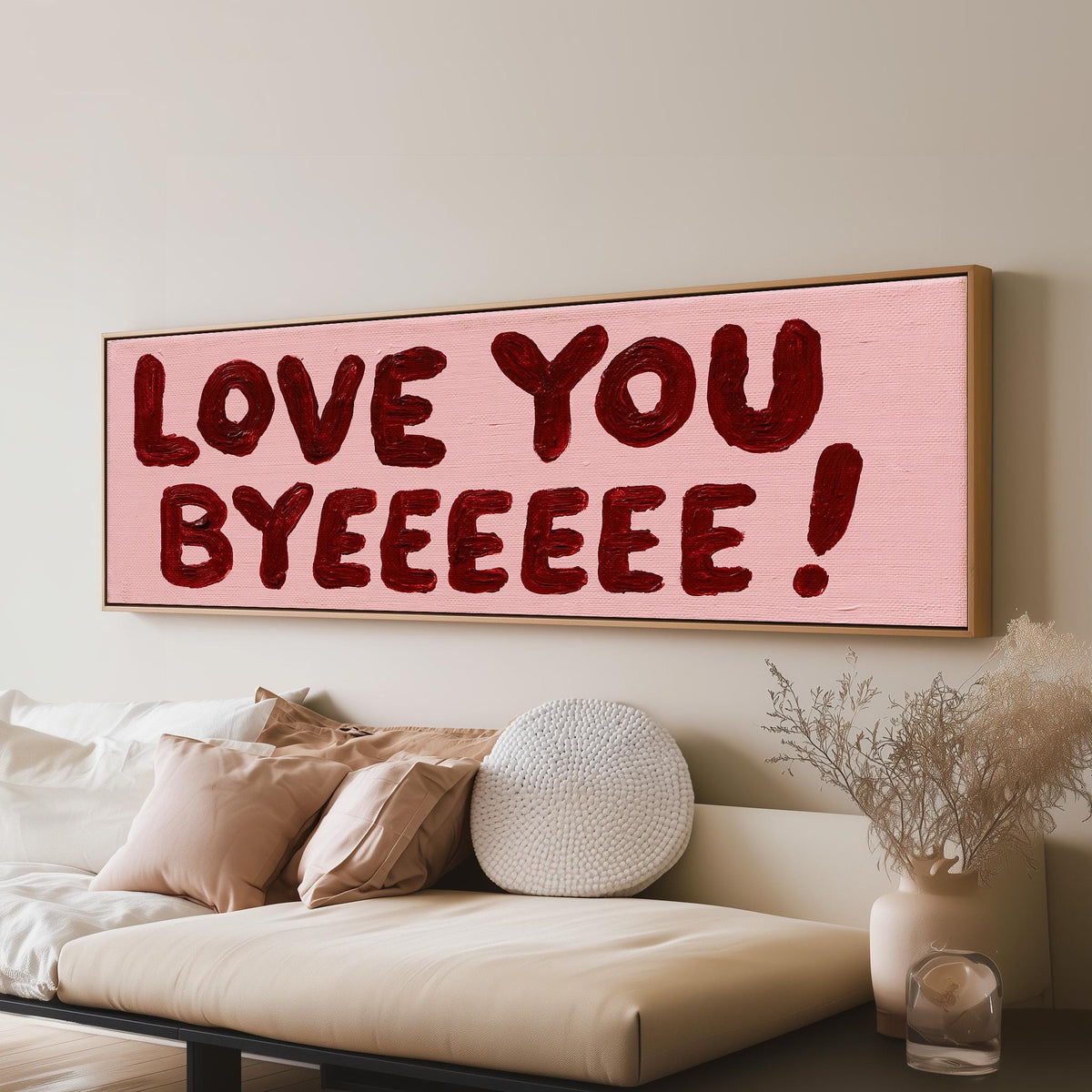 Love you byeeeee retro quote panoramic canvas print above a sofa in a living room