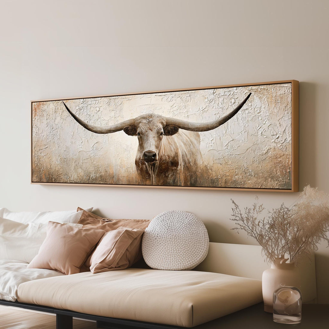 Shaggy longhorn on a textured cream background long horizontal canvas print above a sofa in a living room