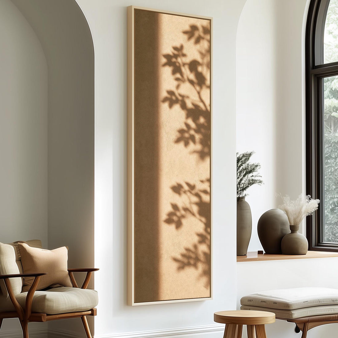 Leaf shadows on a warm tan wall long vertical canvas print in a sunlit living space