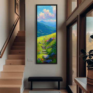 a large painting of a winding path leading through a lush, green landscape with mountains in the background. The painting is hung on the wall above a black bench, creating a serene and inviting atmosphere in the room.