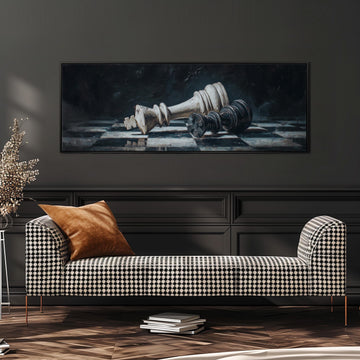 a large black and white checkered sofa with a brown throw pillow, set against a dark wall with a framed painting of a chess king and pieces above it.