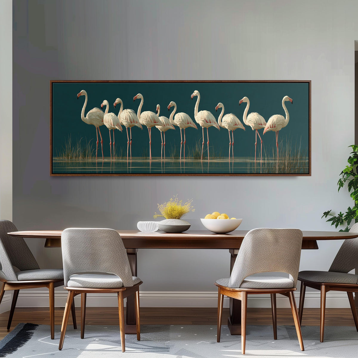 Pale flamingos wading on teal long horizontal canvas print above a dining table
