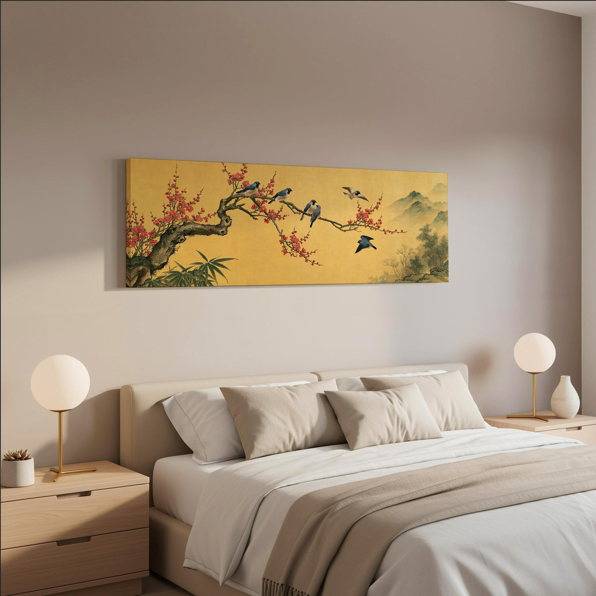 Birds on a plum blossom branch on gold wide panoramic canvas print above a bed in a neutral bedroom