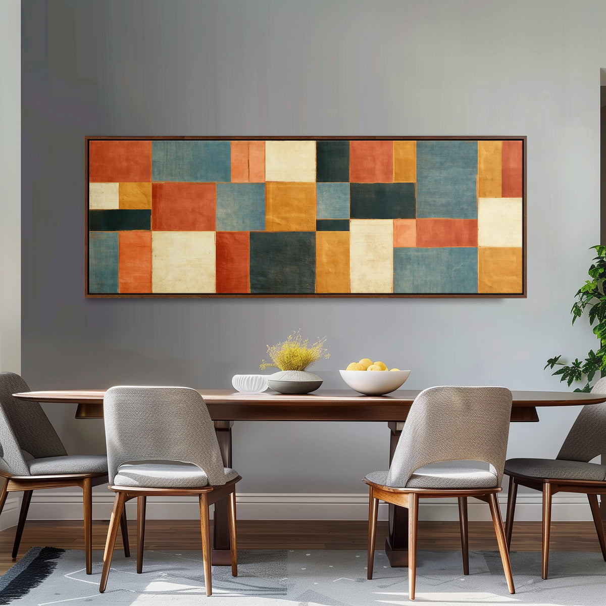 Rust, gold, navy and cream quilt blocks long horizontal canvas print above a dining table