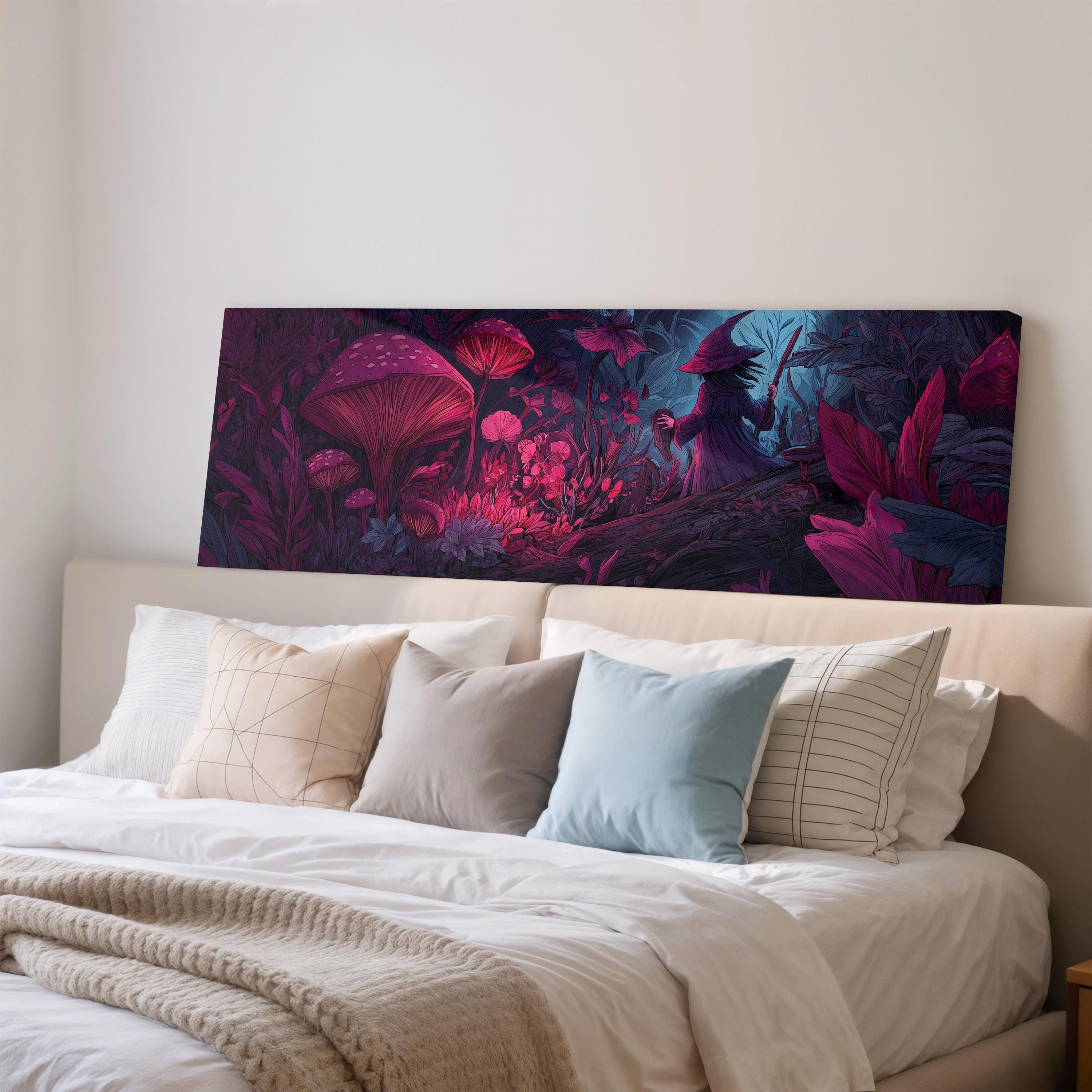 a large, colorful painting of a mushroom forest hanging on a wall above a bed with white pillows and a gray blanket.