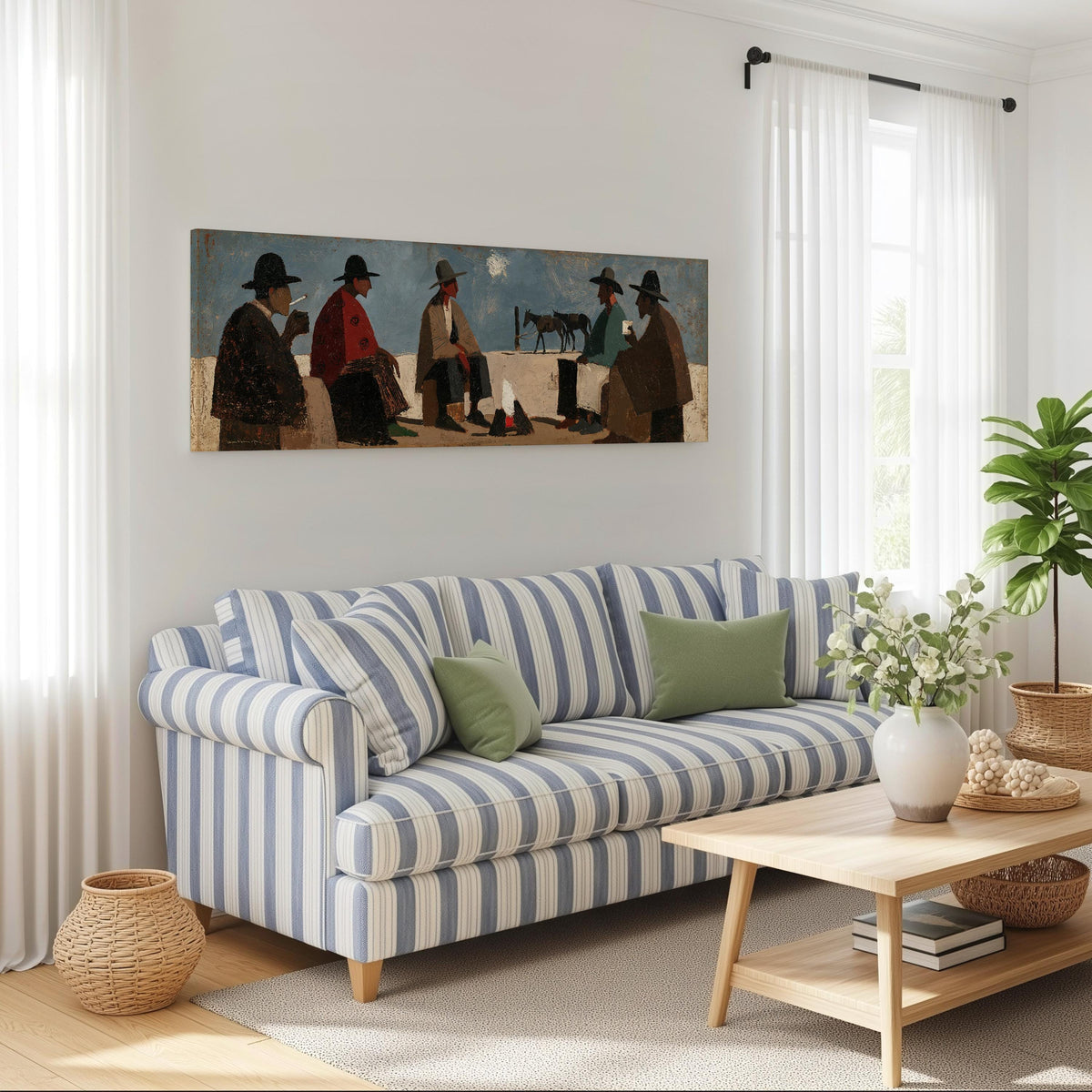 Cowboys gathered around a campfire long horizontal canvas print above a striped sofa in a coastal living room