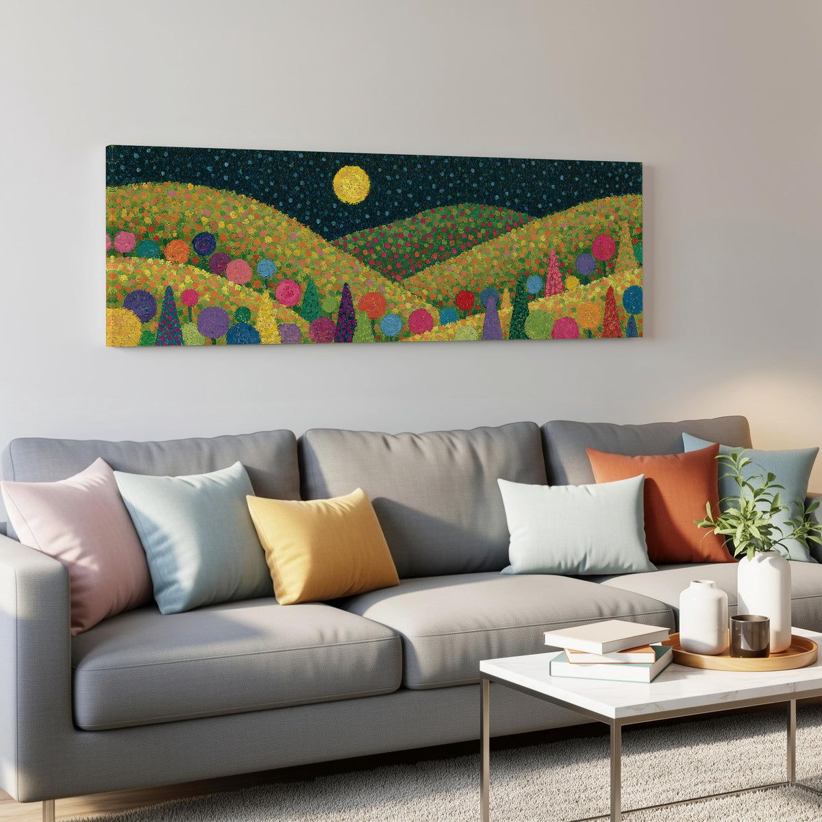 Moonlit pastel flower hills panoramic canvas print above a grey sofa in a living room