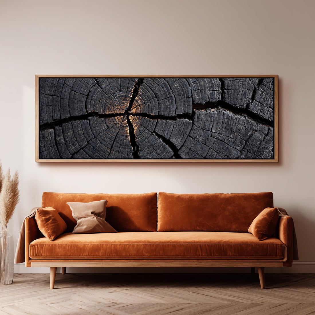Charcoal tree ring cross section long horizontal canvas print above a sofa in a living room