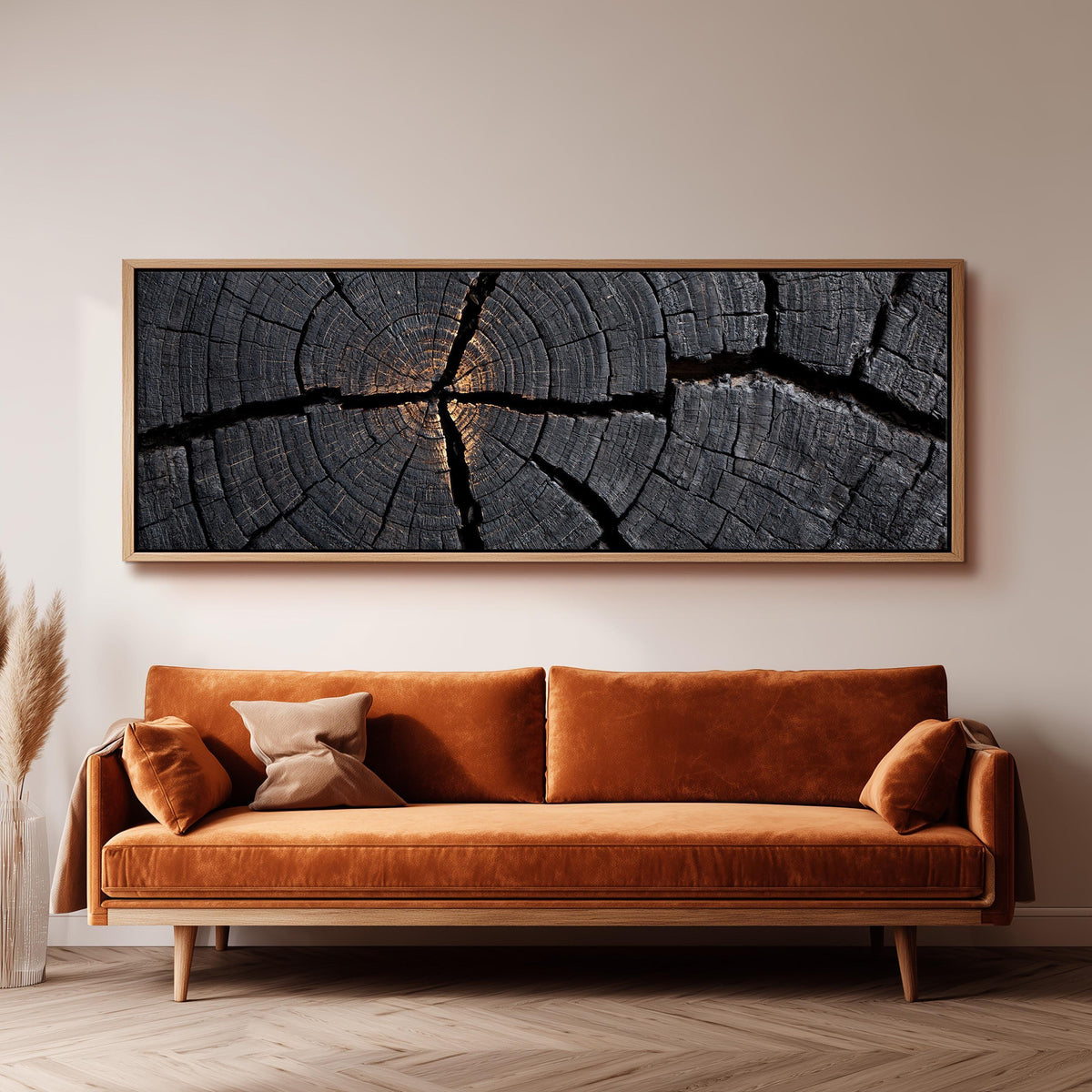 Charcoal tree ring cross section panoramic canvas print above a sofa in a living room