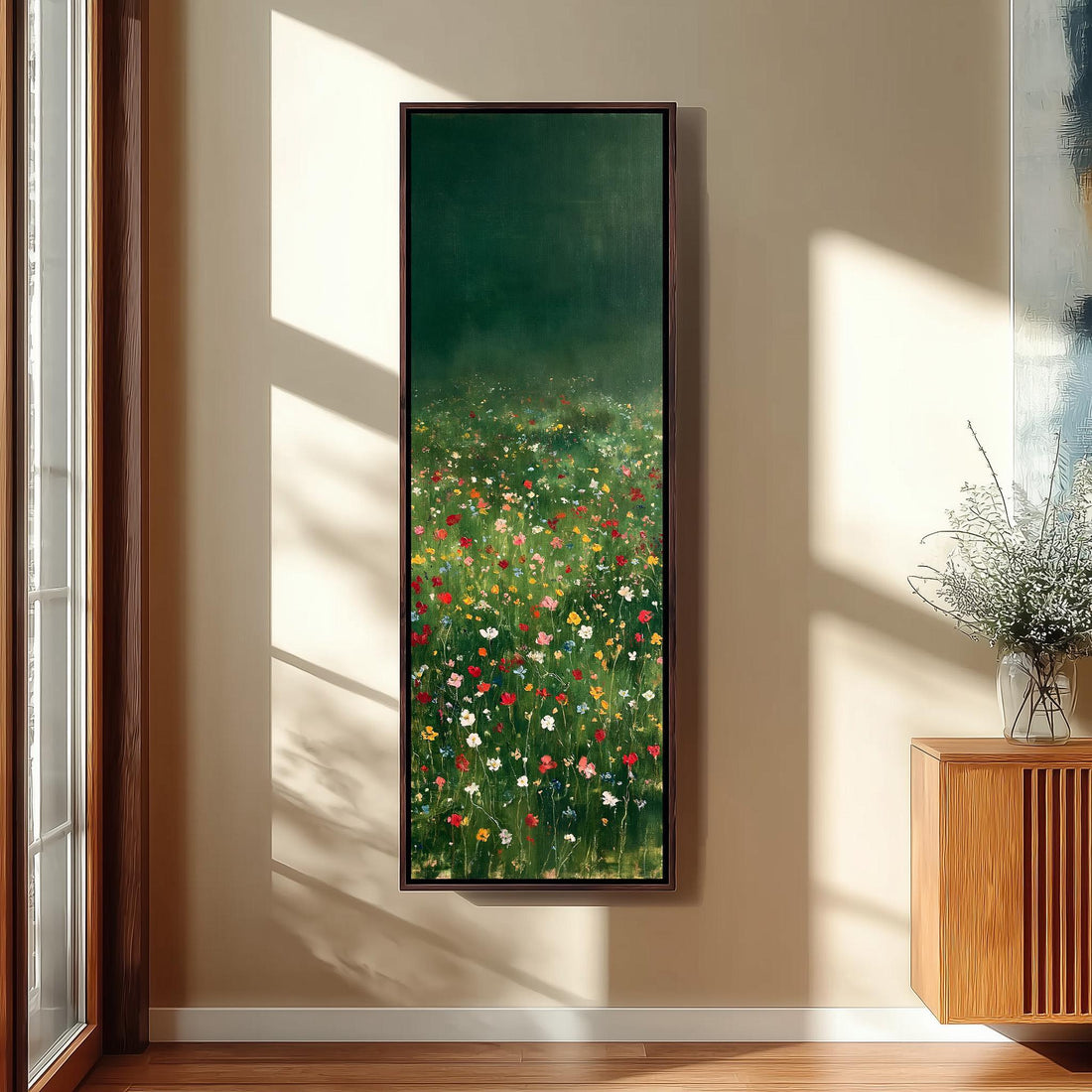 Wildflower meadow under a dark green sky long vertical canvas print in a sunlit living space