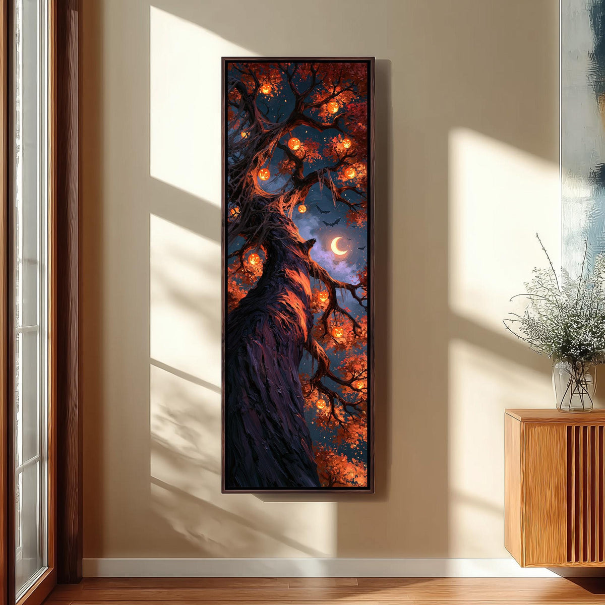 Twisted tree hung with glowing jack-o'-lanterns long vertical canvas print in a sunlit living space