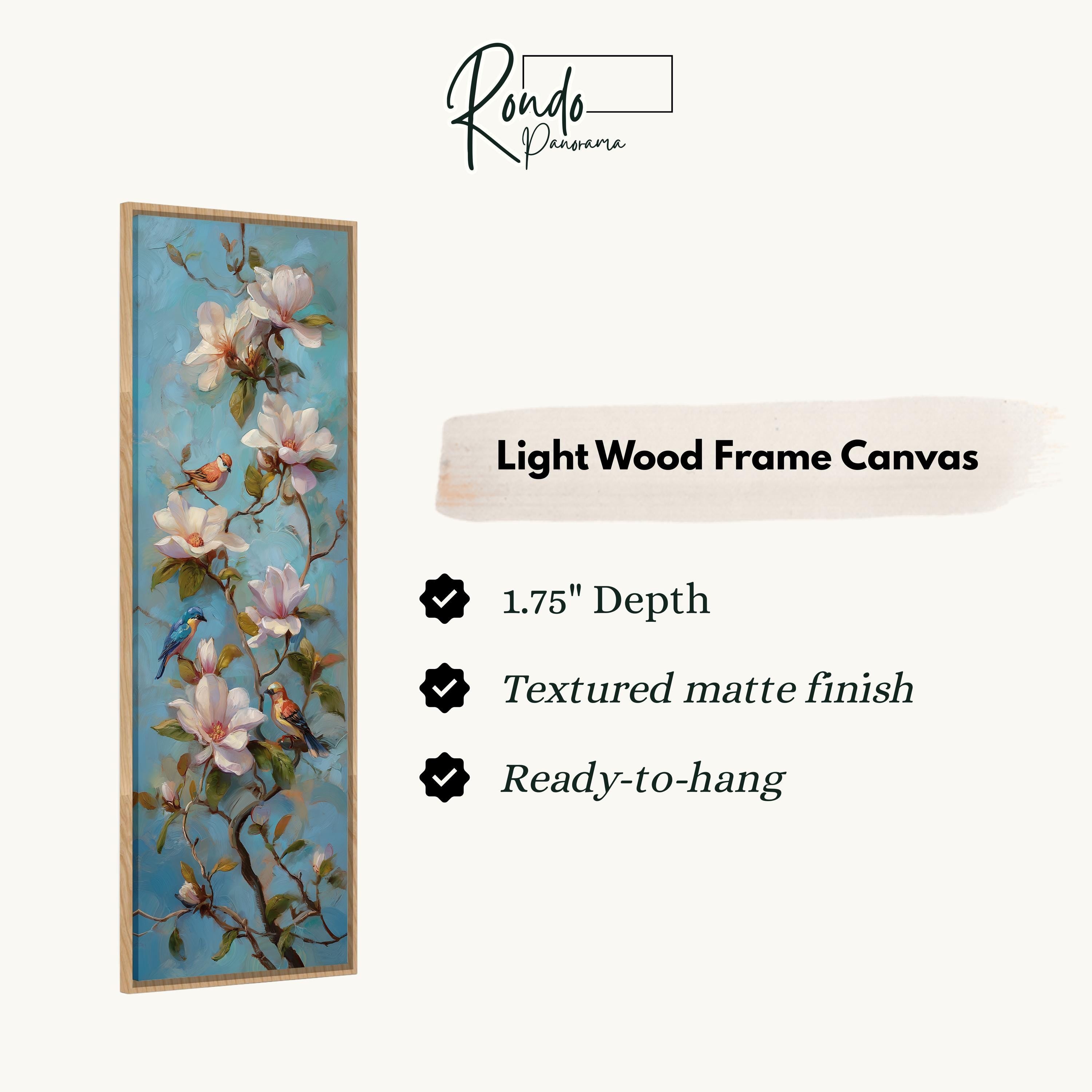 The image is a light wood frame canvas featuring a painting of pink flowers with green leaves and a bird perched on a branch.