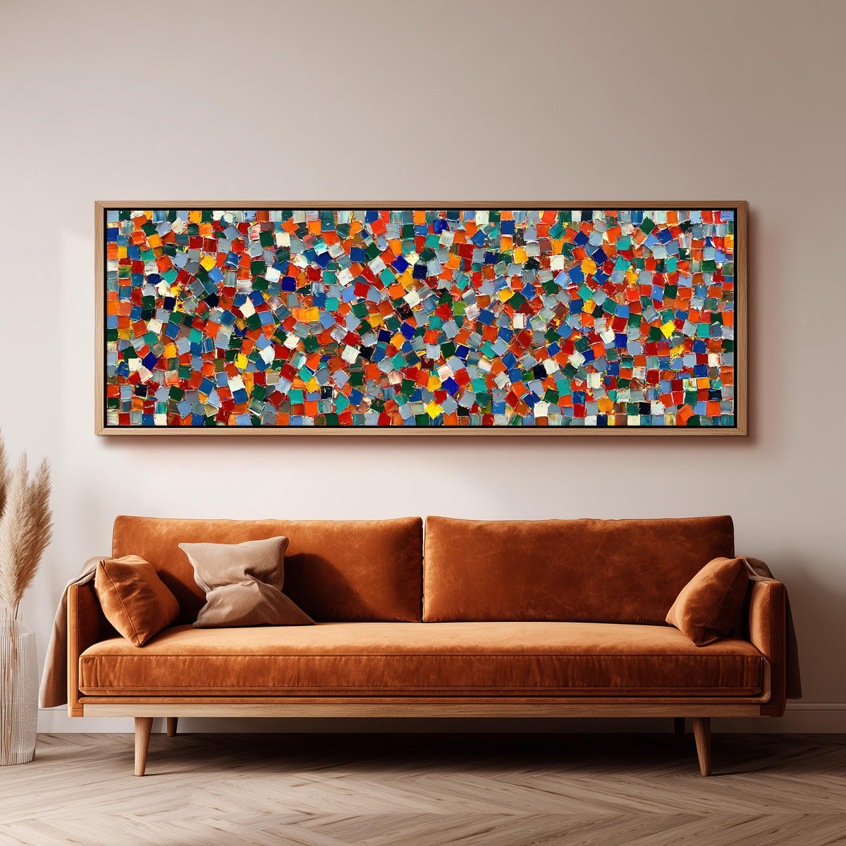 Colorful confetti mosaic squares long horizontal canvas print above a sofa in a living room