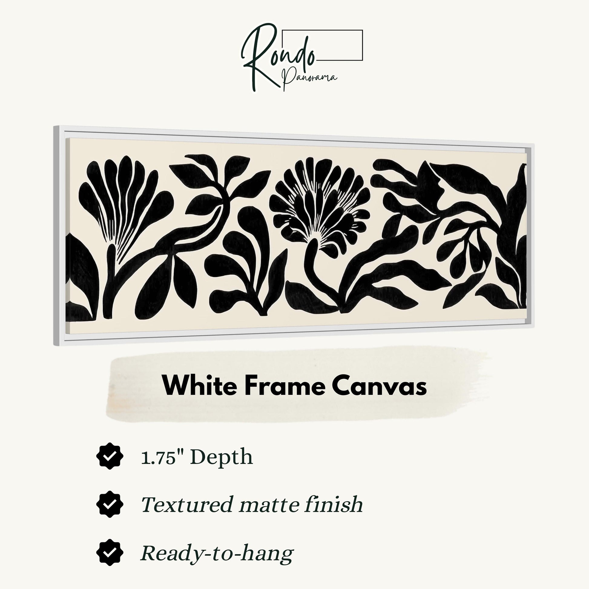 a white frame canvas with a black and white floral design.
