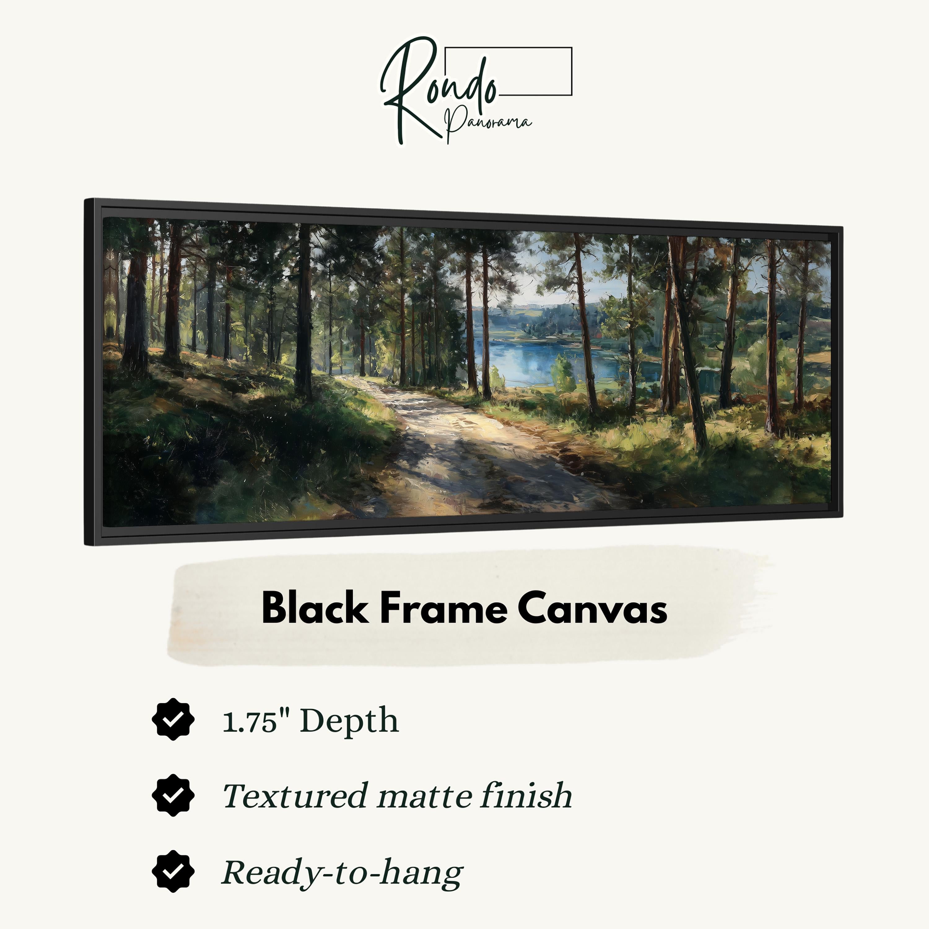 The image is a black frame canvas depicting a forest scene with a path leading through the trees.