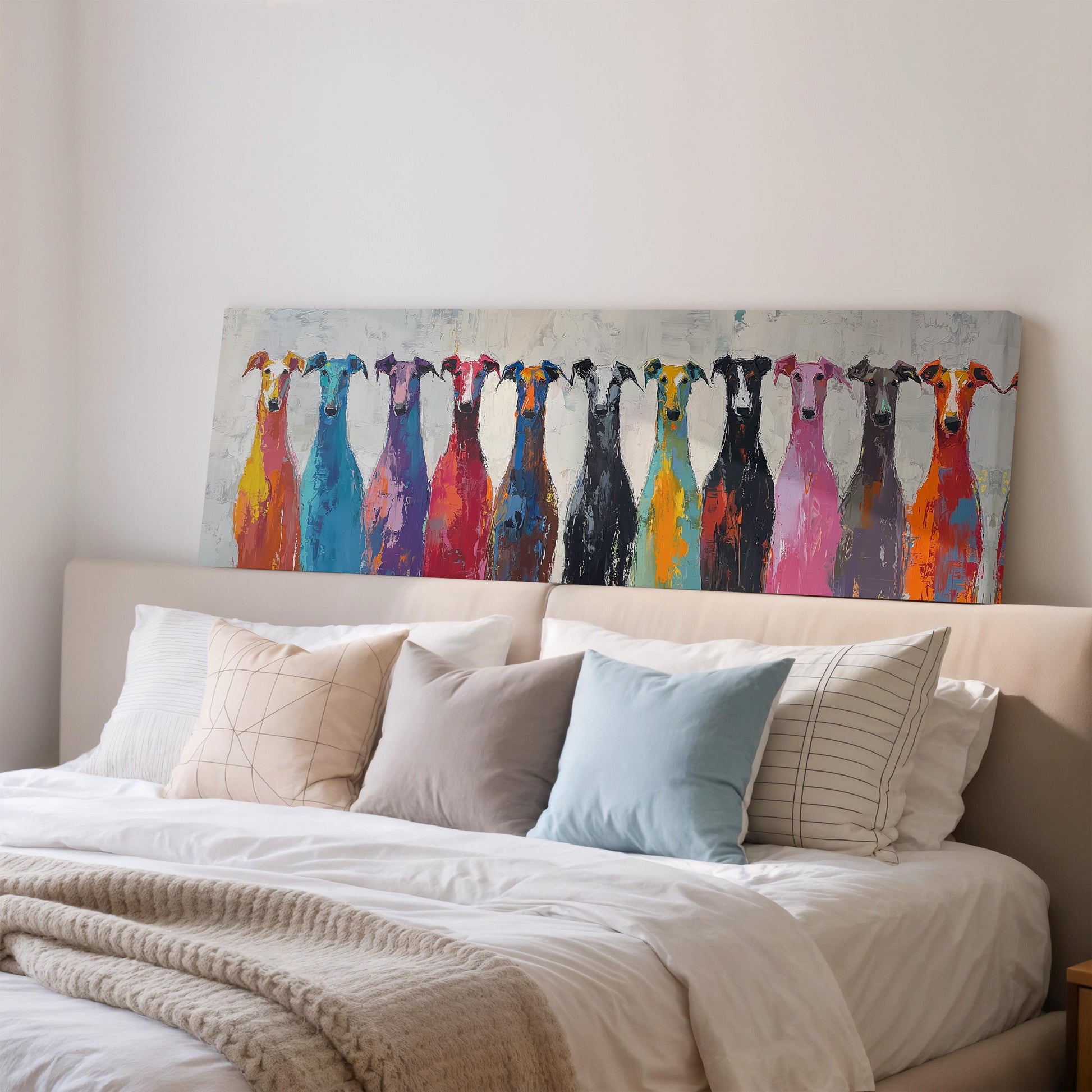 a large painting of colorful dogs on a wall above a bed with white bedding and pillows.