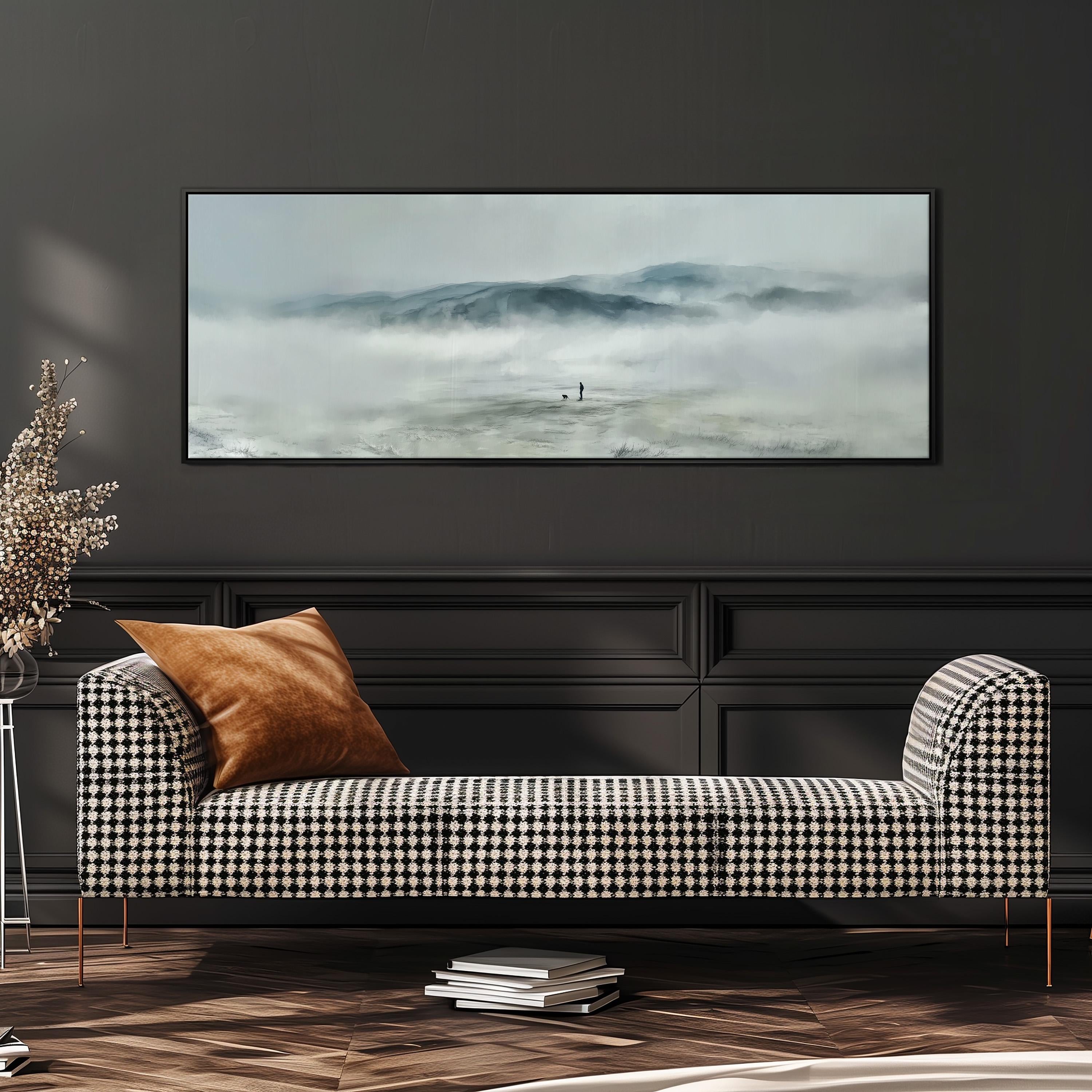 a black and white checkered sofa with a brown throw pillow, positioned in front of a large framed landscape painting depicting a misty mountain scene.