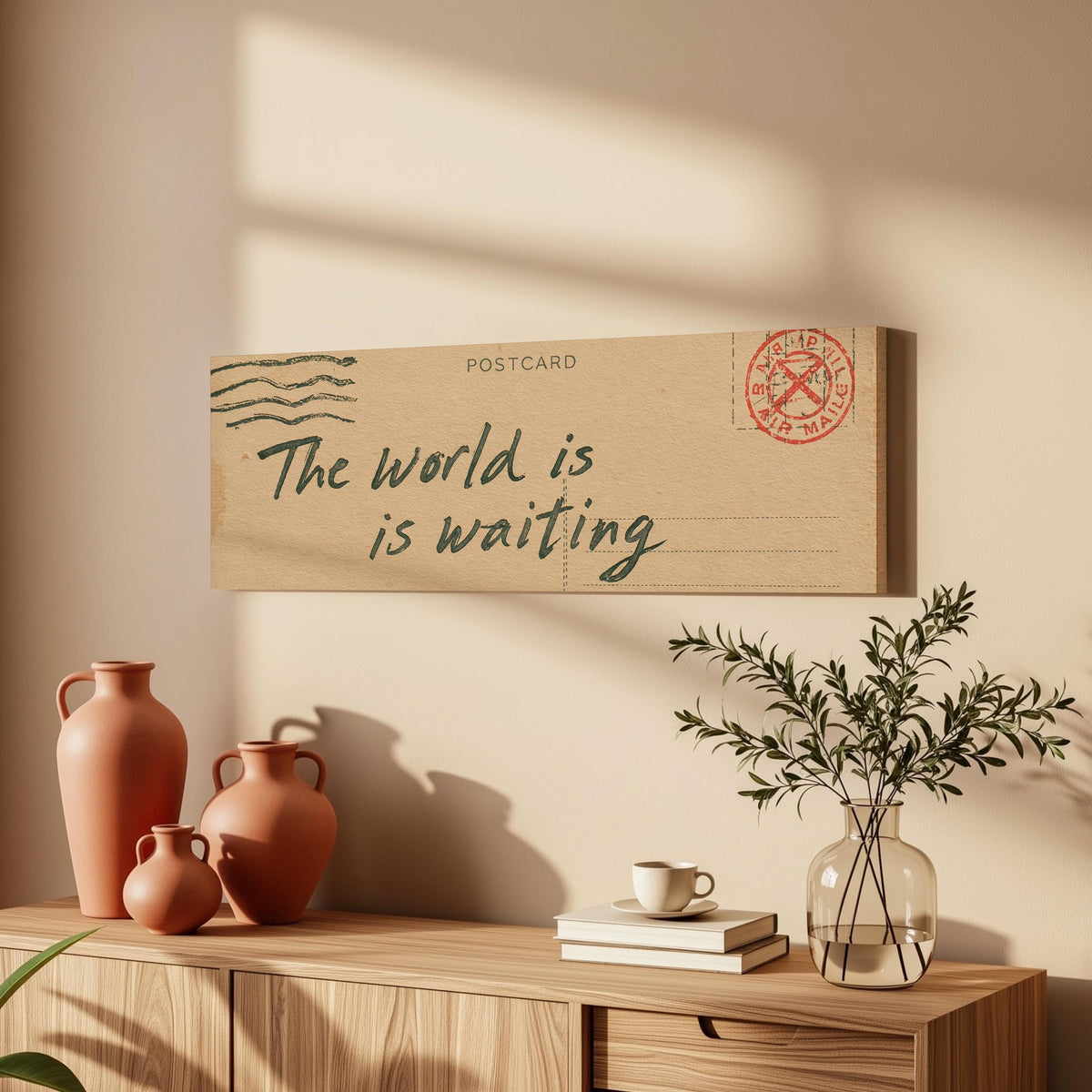 Vintage postcard saying the world is waiting long horizontal canvas print above a wooden sideboard
