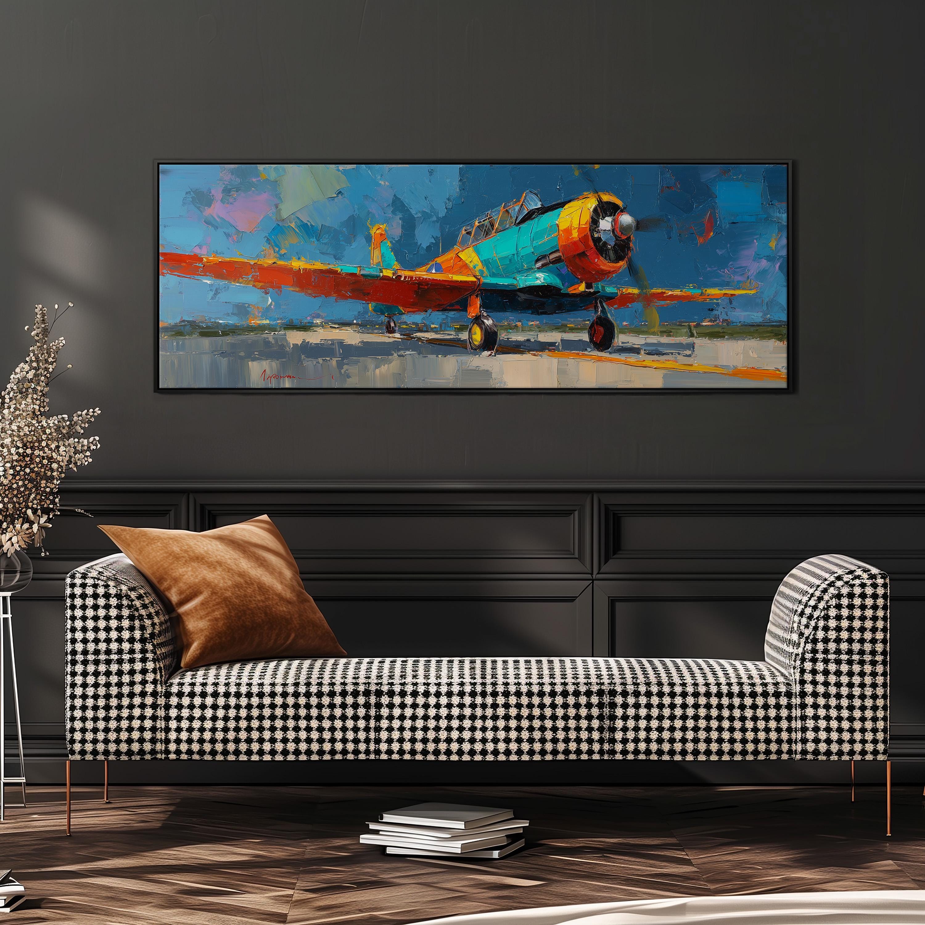 a large, colorful painting of a propeller plane hanging on a wall above a black and white checkered sofa.