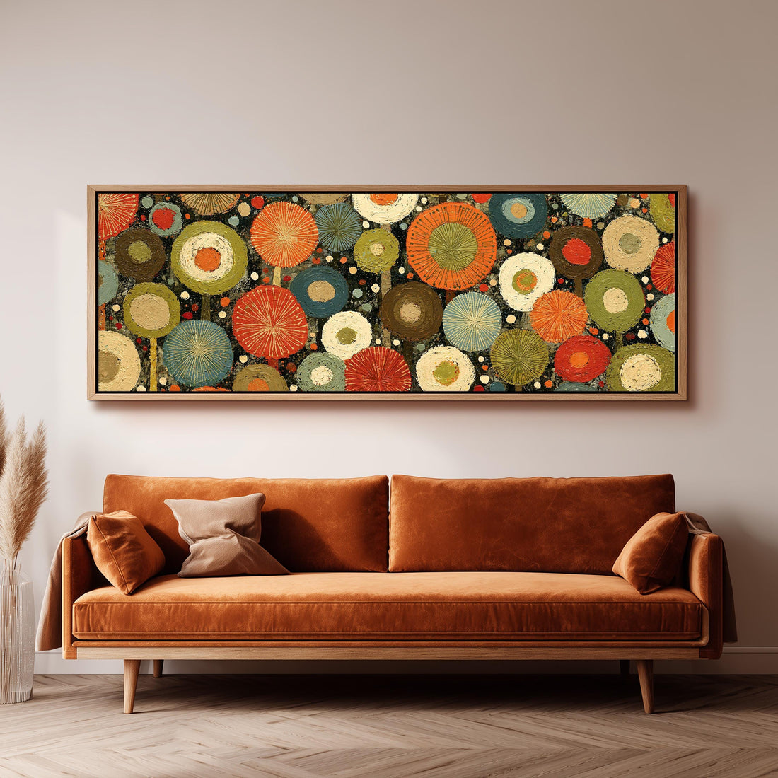 Layered circle dot pattern long horizontal canvas print above a sofa in a living room