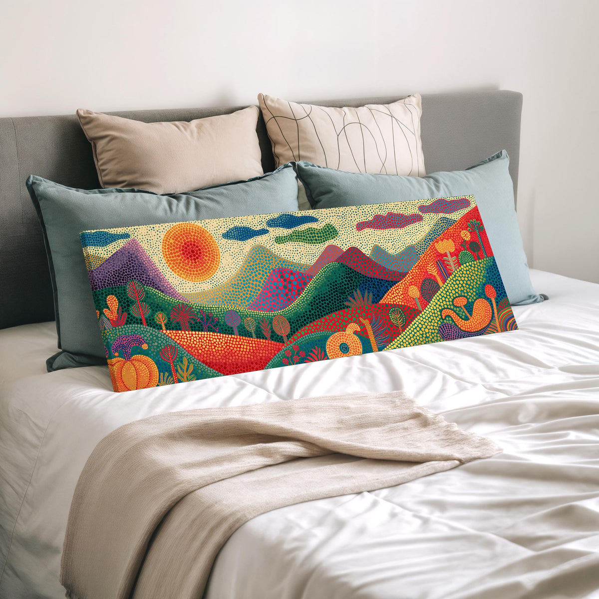Dotted mountains under a sunburst wide panoramic canvas print laid on a bed to show its size