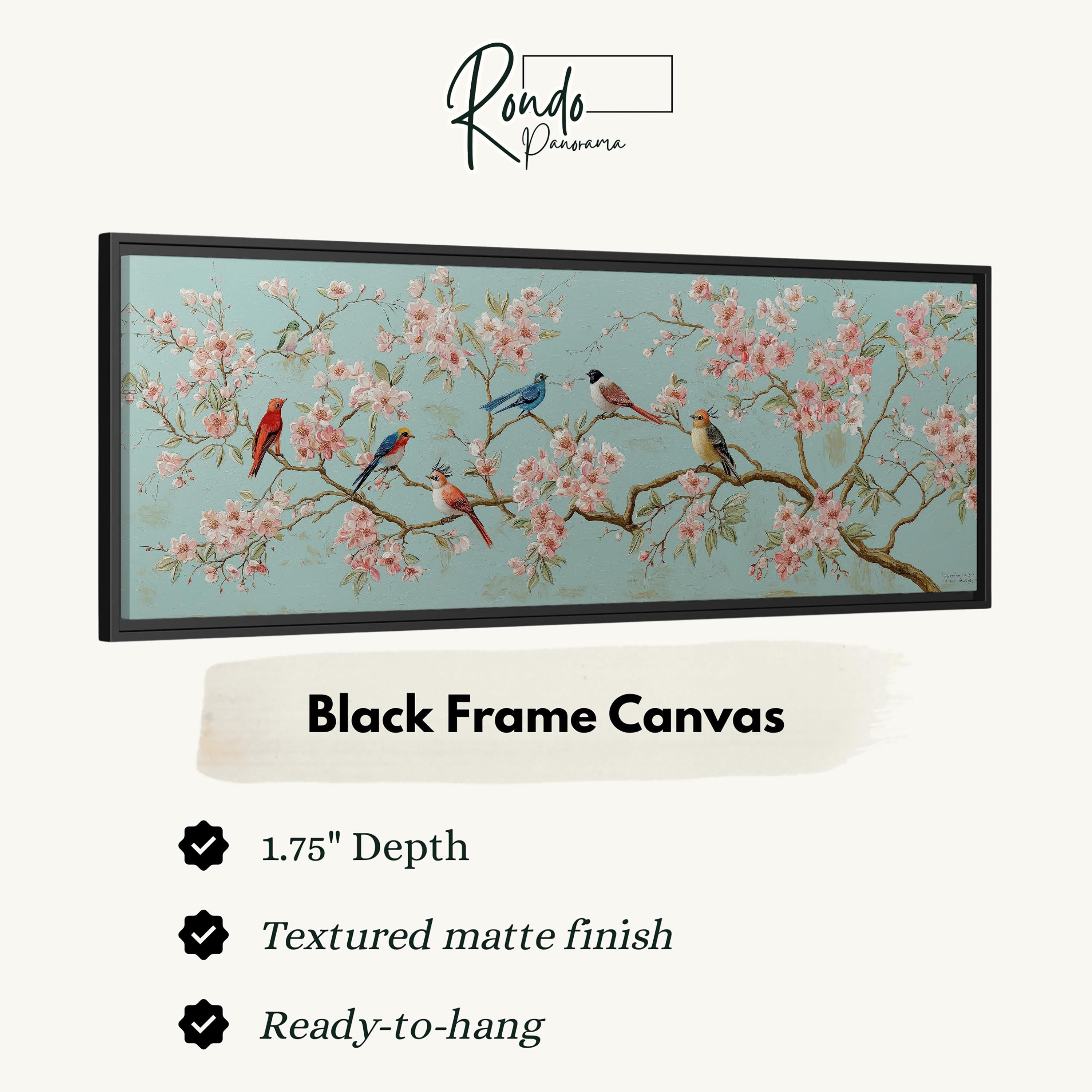 a black frame canvas with a painting of birds perched on branches with pink flowers. The canvas has a 1.75" depth and is textured with a matte finish. It is ready to hang.