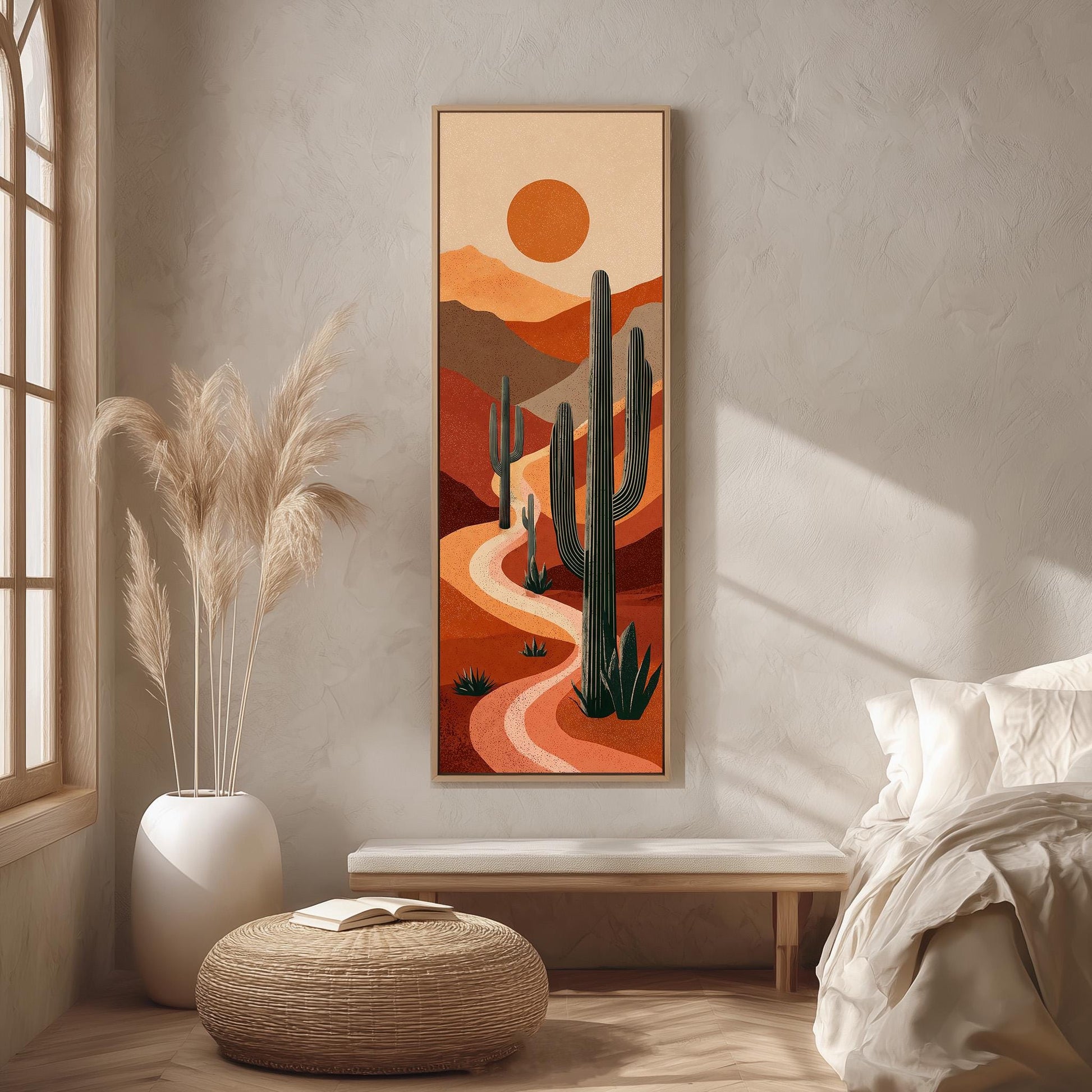 a desert landscape with a winding path, cacti, and a sun in the sky. The scene is framed and hung on a wall, creating a desert-themed atmosphere.