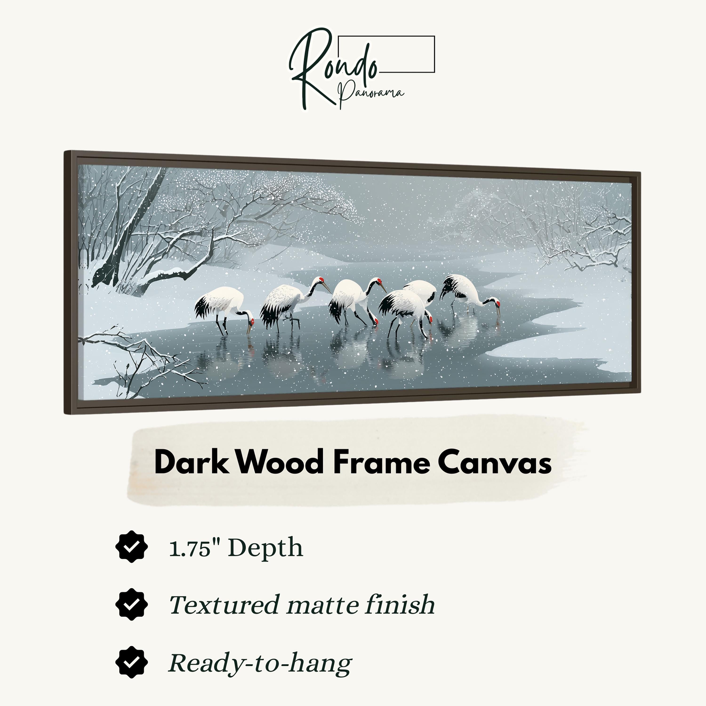 A framed artwork depicting a group of white birds wading in a snowy, wintry landscape.