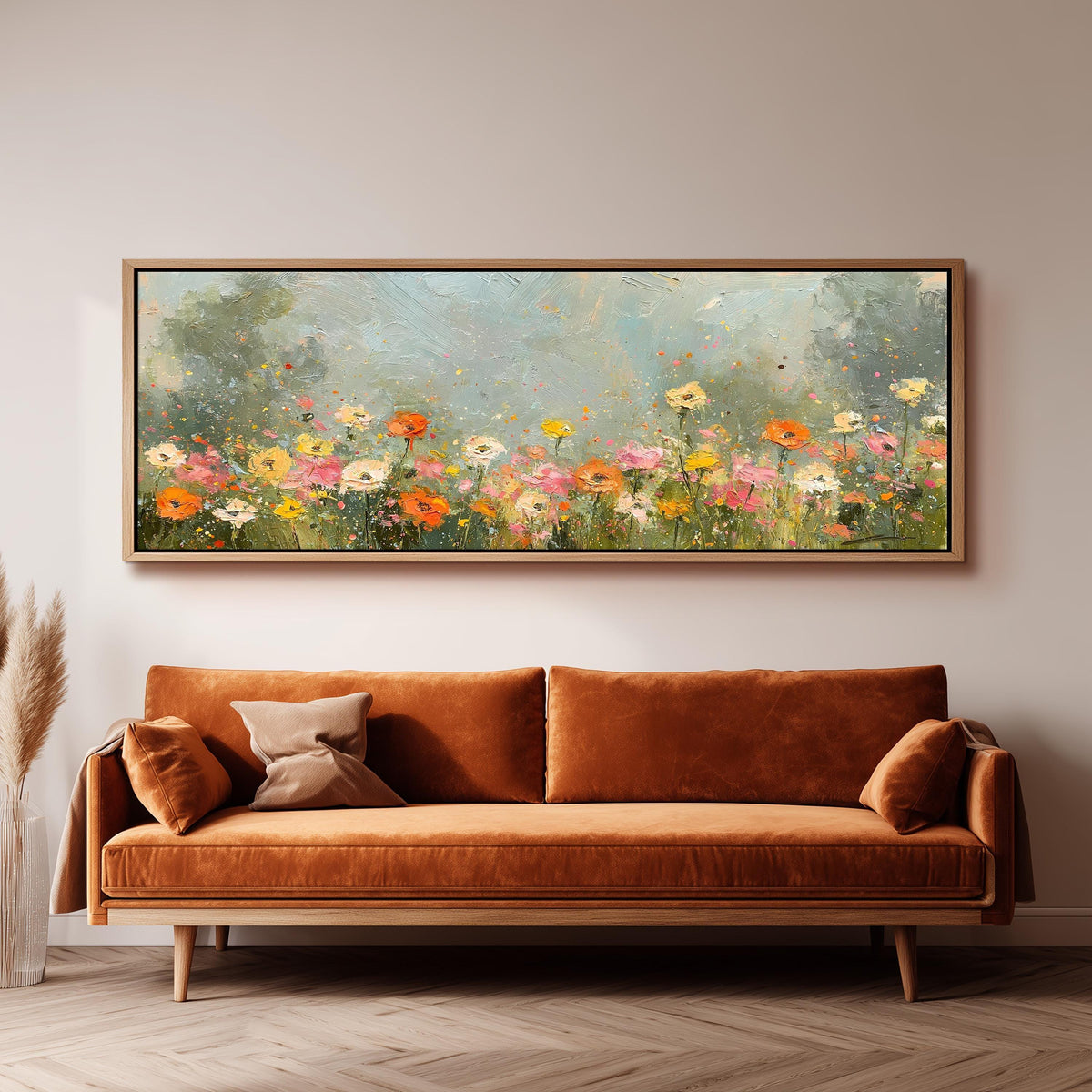 Impressionist wildflower meadow panoramic canvas print above a sofa in a living room