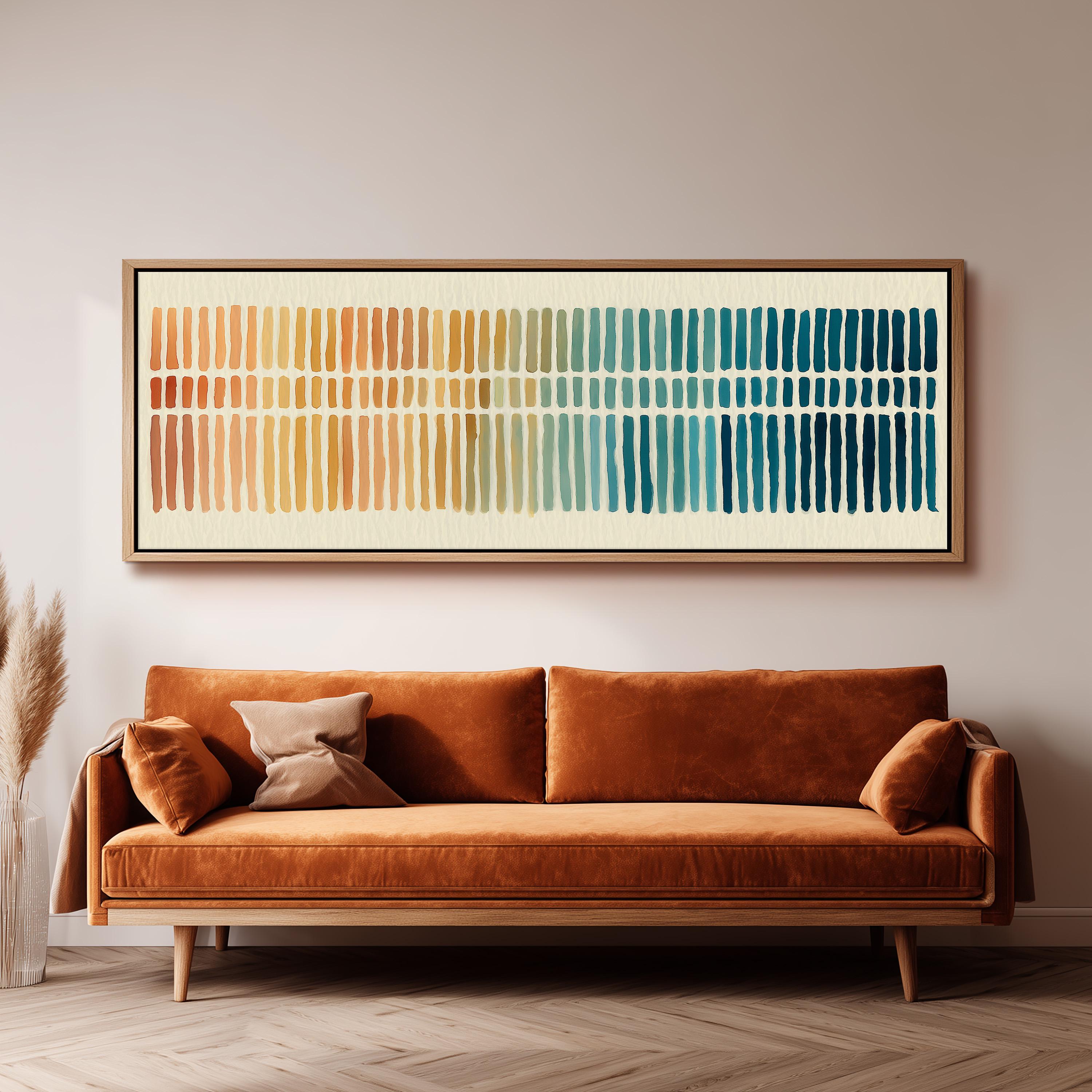 a large, rectangular, abstract painting hanging on a wall above a brown sofa.