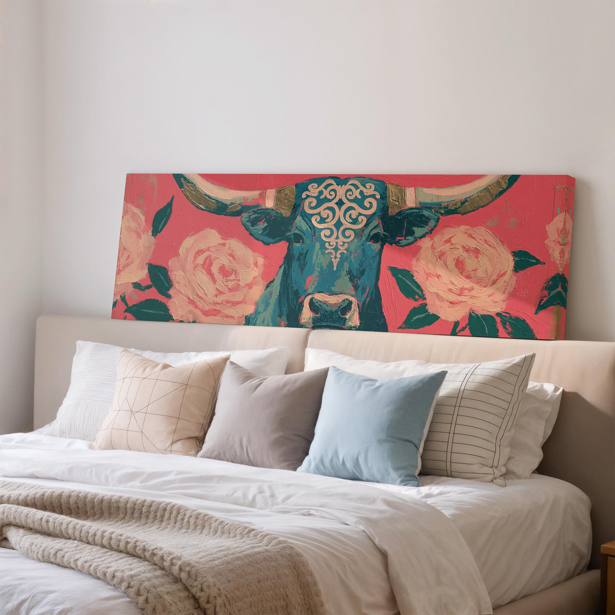 Longhorn with pink roses wide panoramic canvas print above a bed in a bedroom