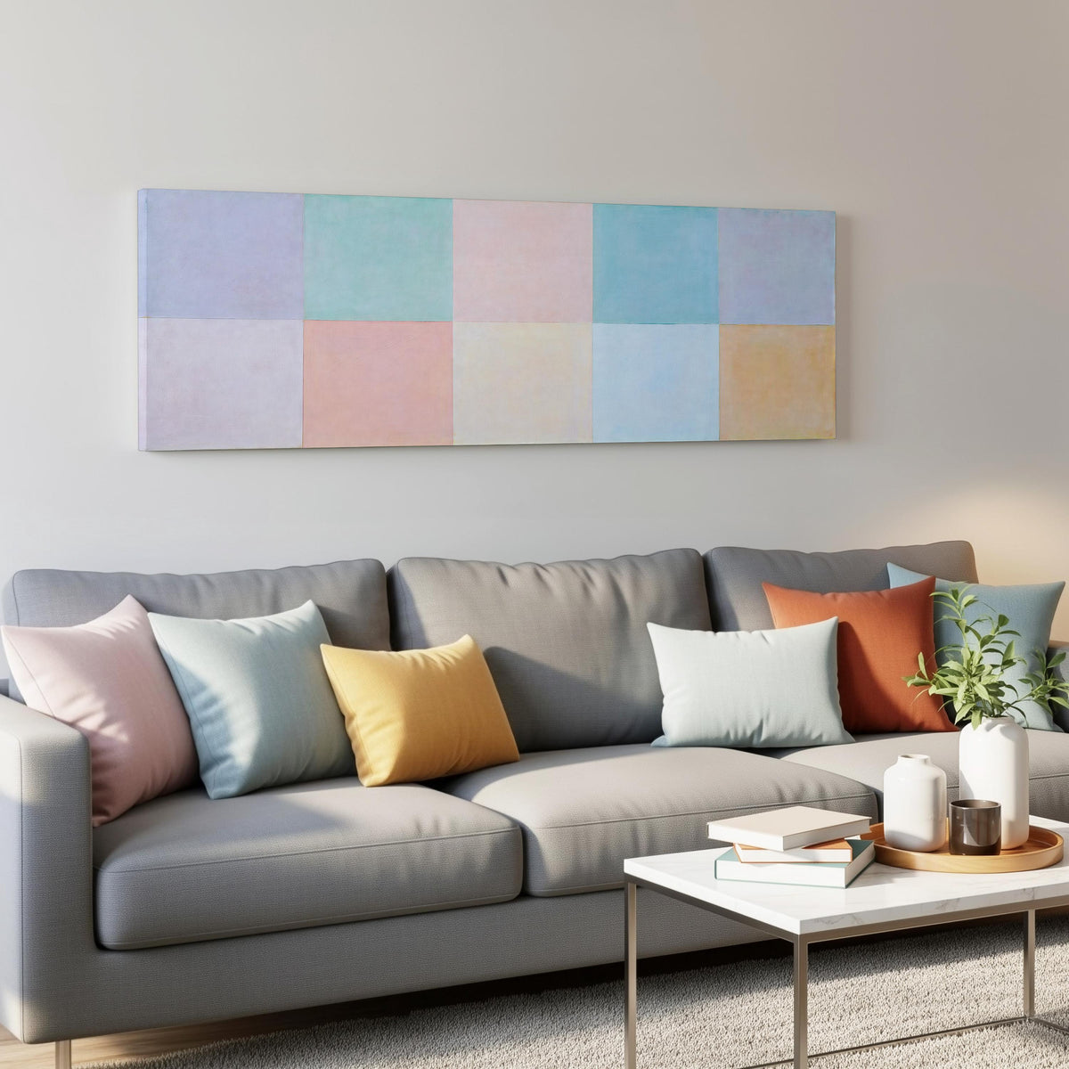 Pastel checkerboard grid panoramic canvas print above a grey sofa in a living room