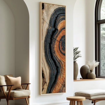 Charred tree ring close up long vertical canvas print in a sunlit living space