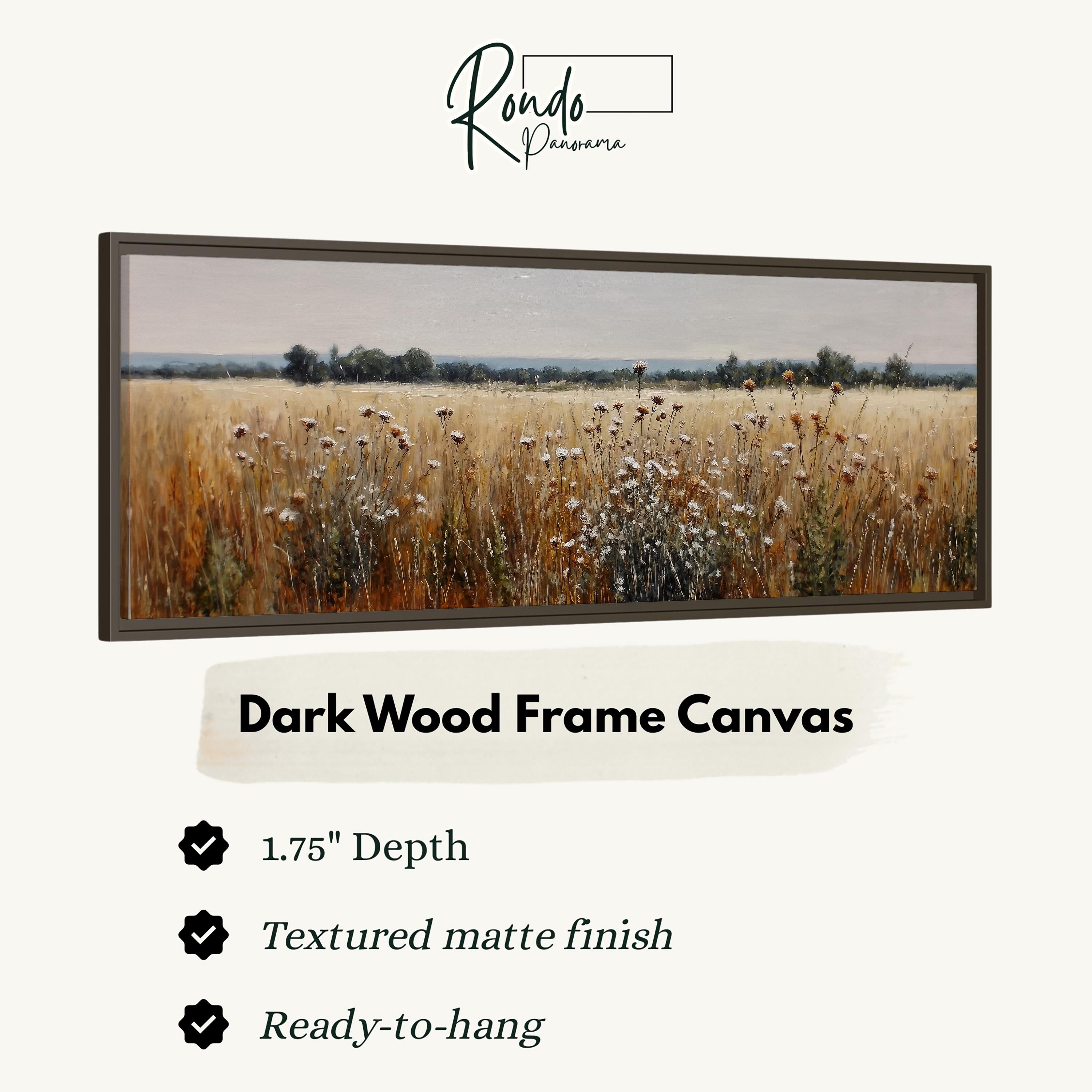 The image is a dark wood frame canvas depicting a field of tall grass with flowers.