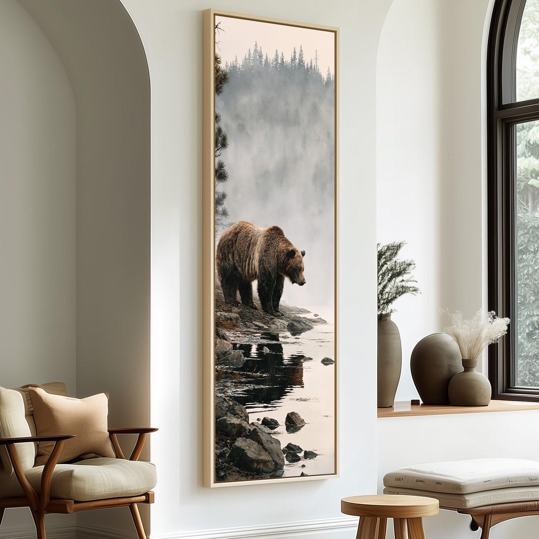 Brown bear on a rocky misty lakeshore long vertical canvas print in a sunlit living space