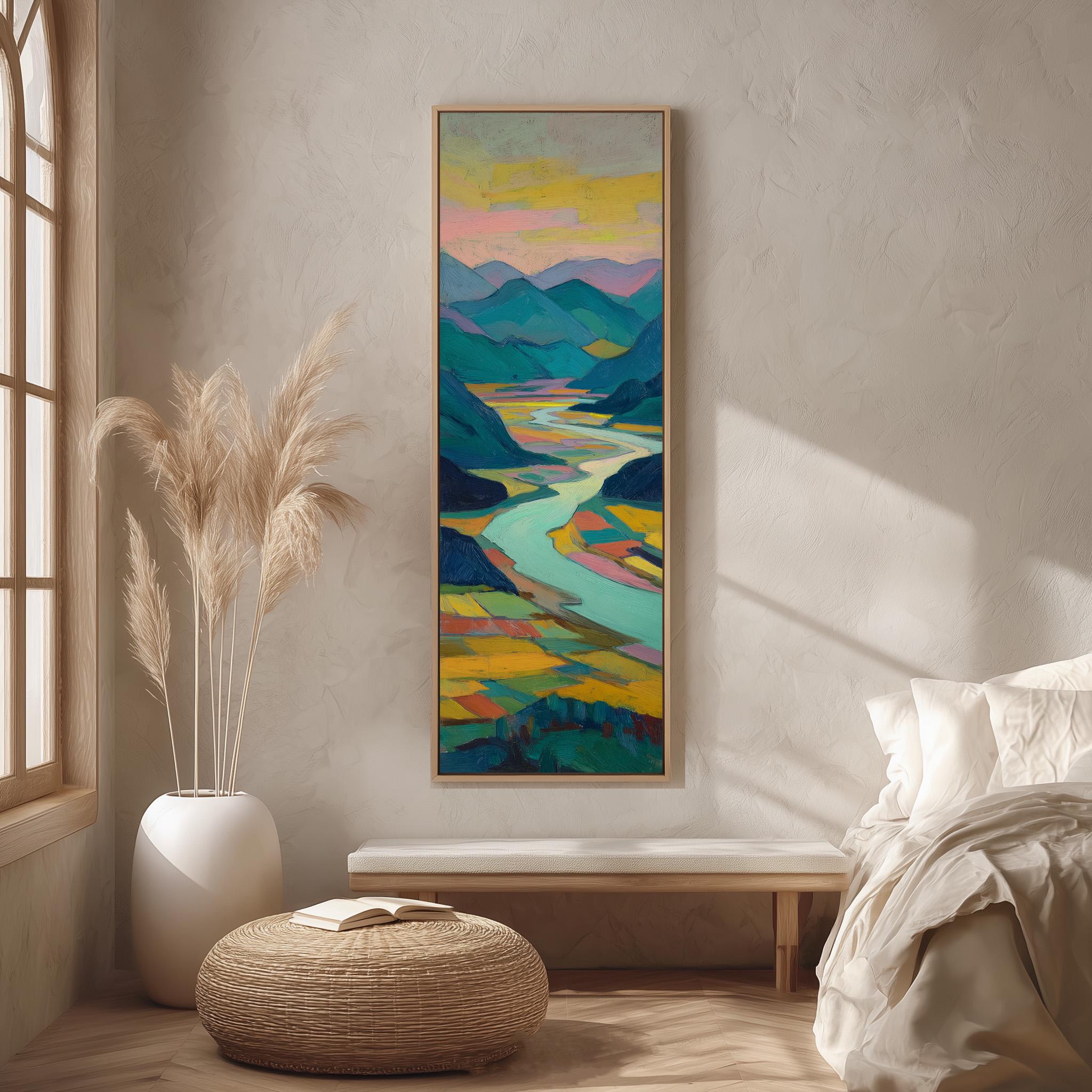 a large, colorful painting of a landscape hanging on a wall in a room with a bed, a wicker ottoman, and a potted plant.