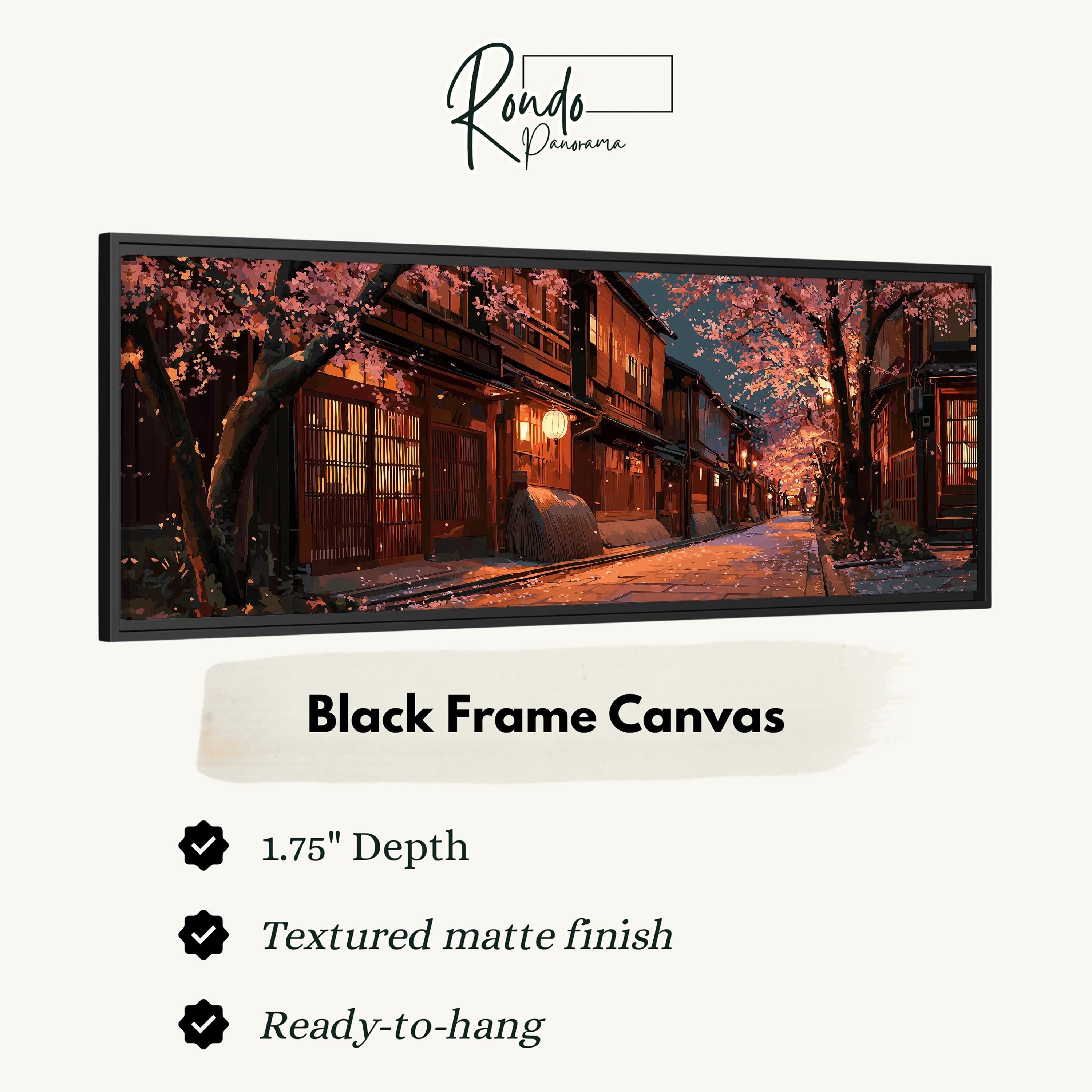 The image is a black frame canvas depicting a serene street scene with cherry blossom trees in full bloom, illuminated by warm lighting.