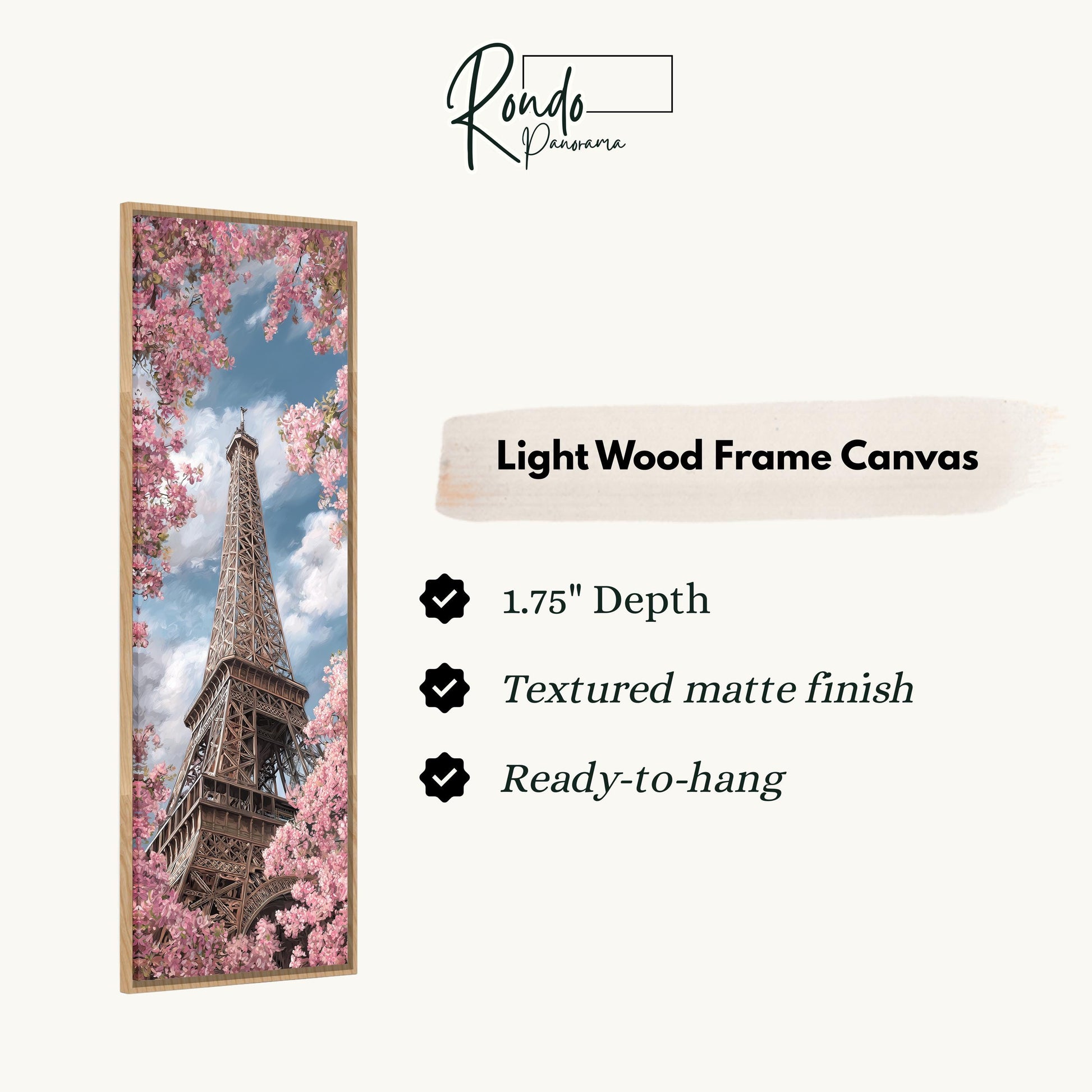 a light wood frame canvas depicting the Eiffel Tower surrounded by pink cherry blossoms.