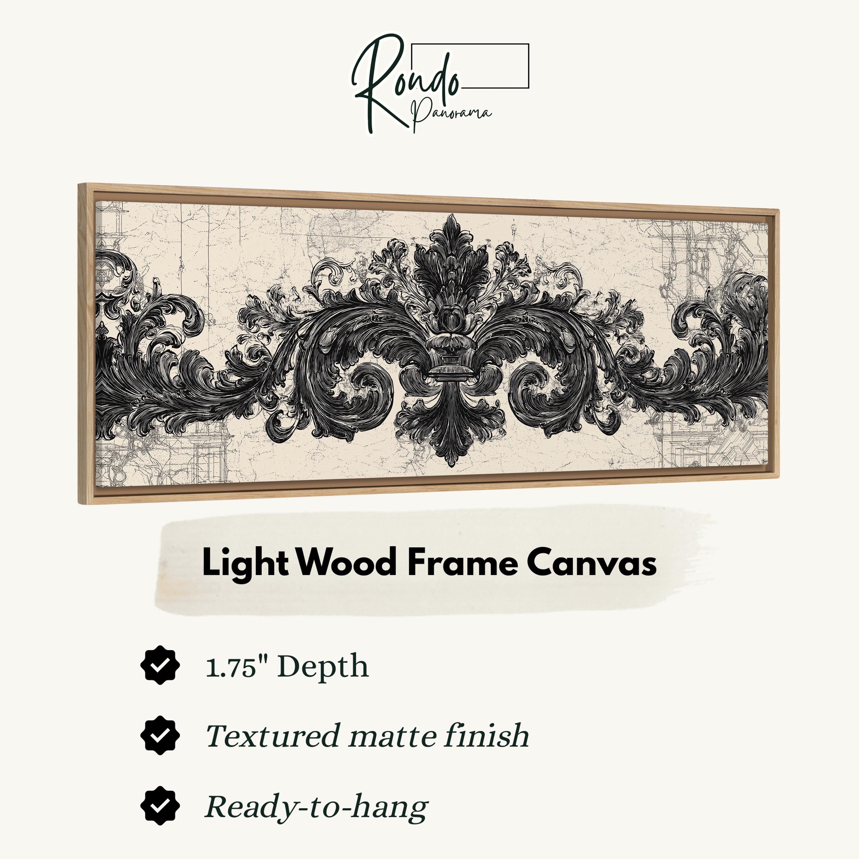 a light wood frame canvas with an ornate, decorative design in black and white.