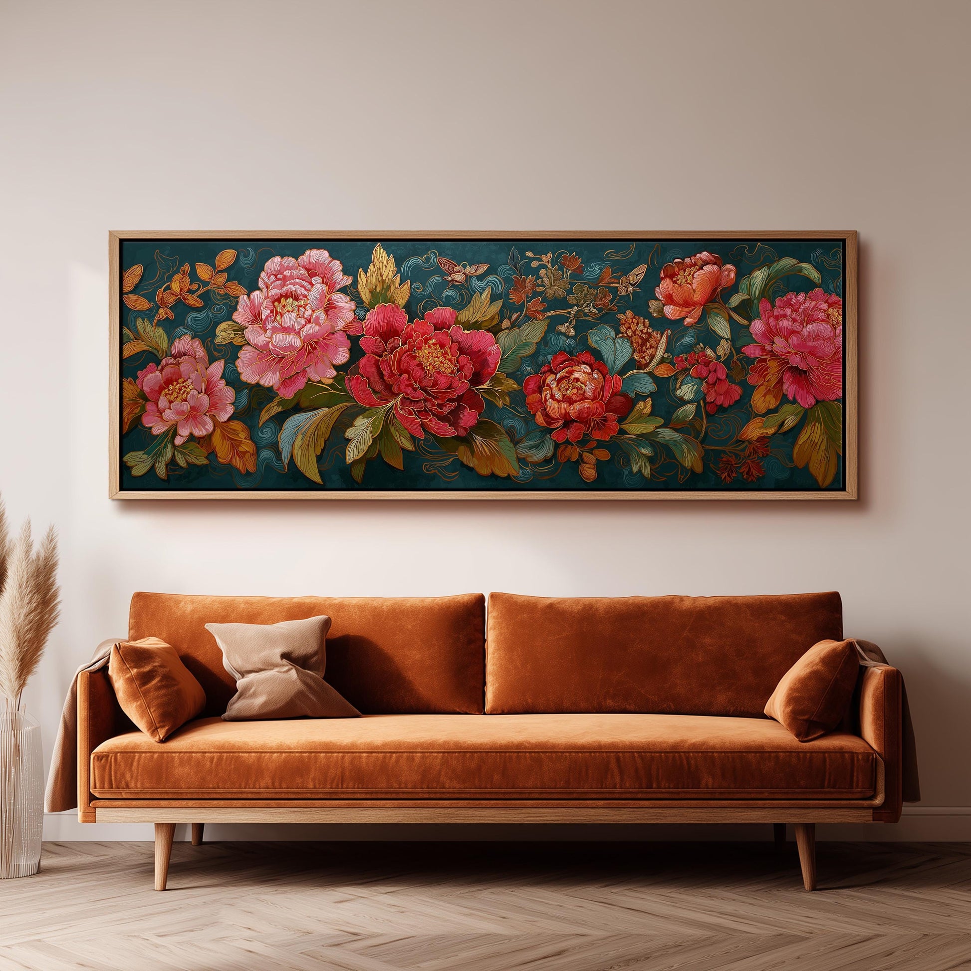 a large, ornate floral painting hanging on a wall above a brown sofa with a wooden frame.