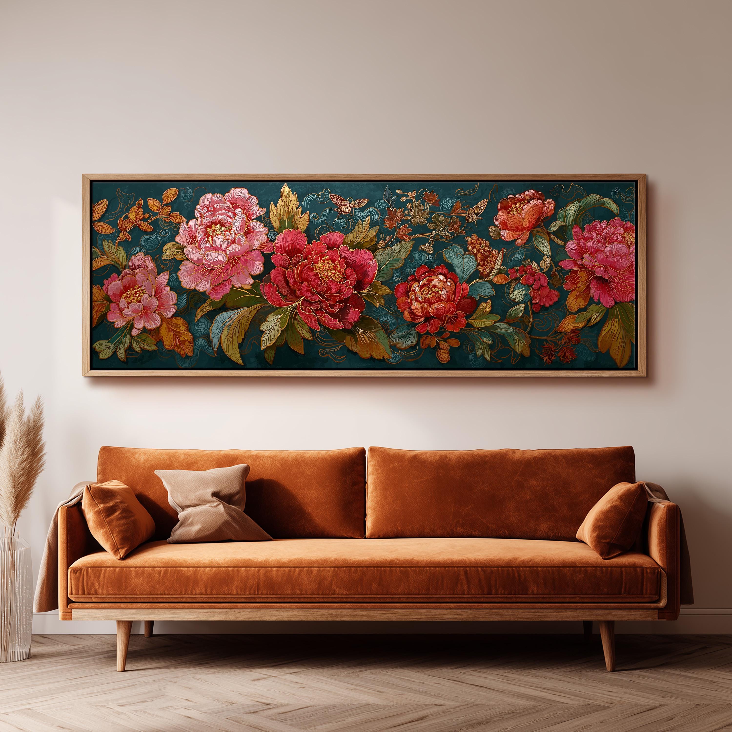 a large, ornate floral painting hanging on a wall above a brown sofa with a wooden frame.