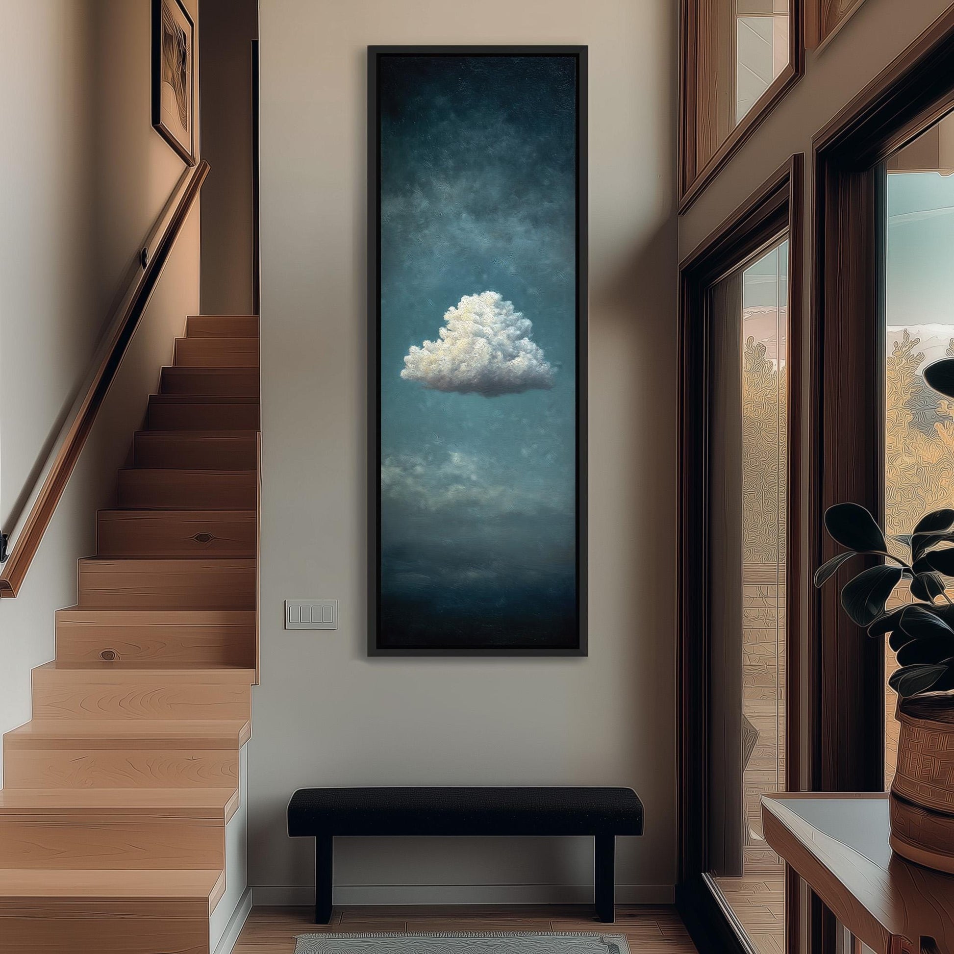 a large painting of a cloud hanging on the wall of a room with wooden stairs and a bench.